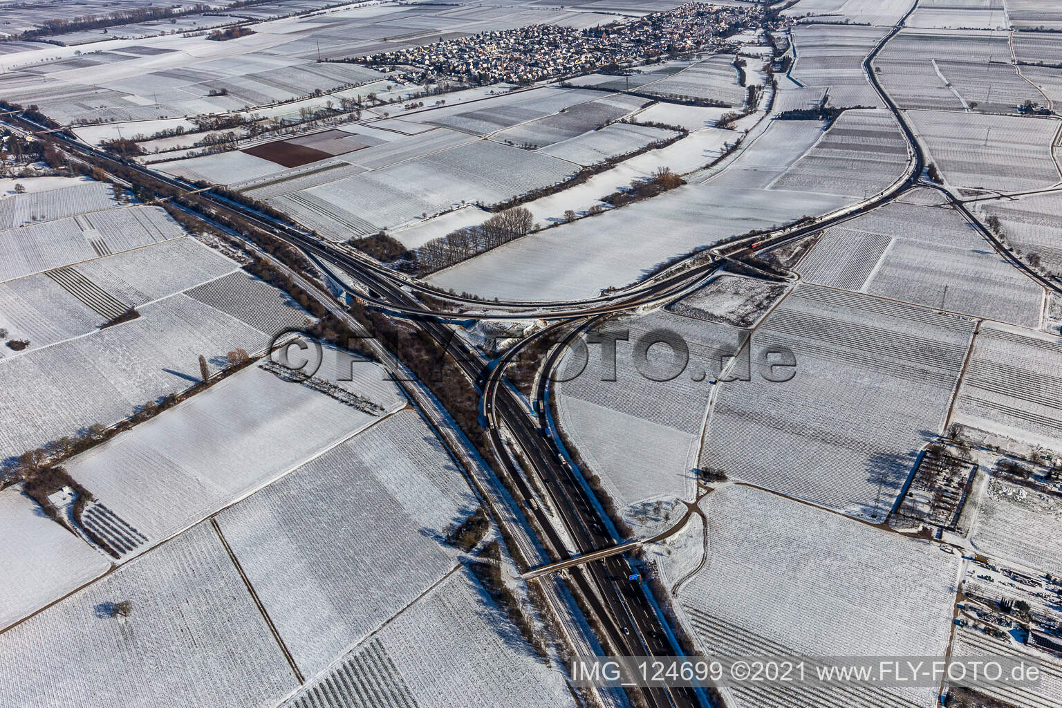 Winter aerial view in the snow Landau Nord motorway exit in the district Dammheim in Landau in der Pfalz in the state Rhineland-Palatinate, Germany