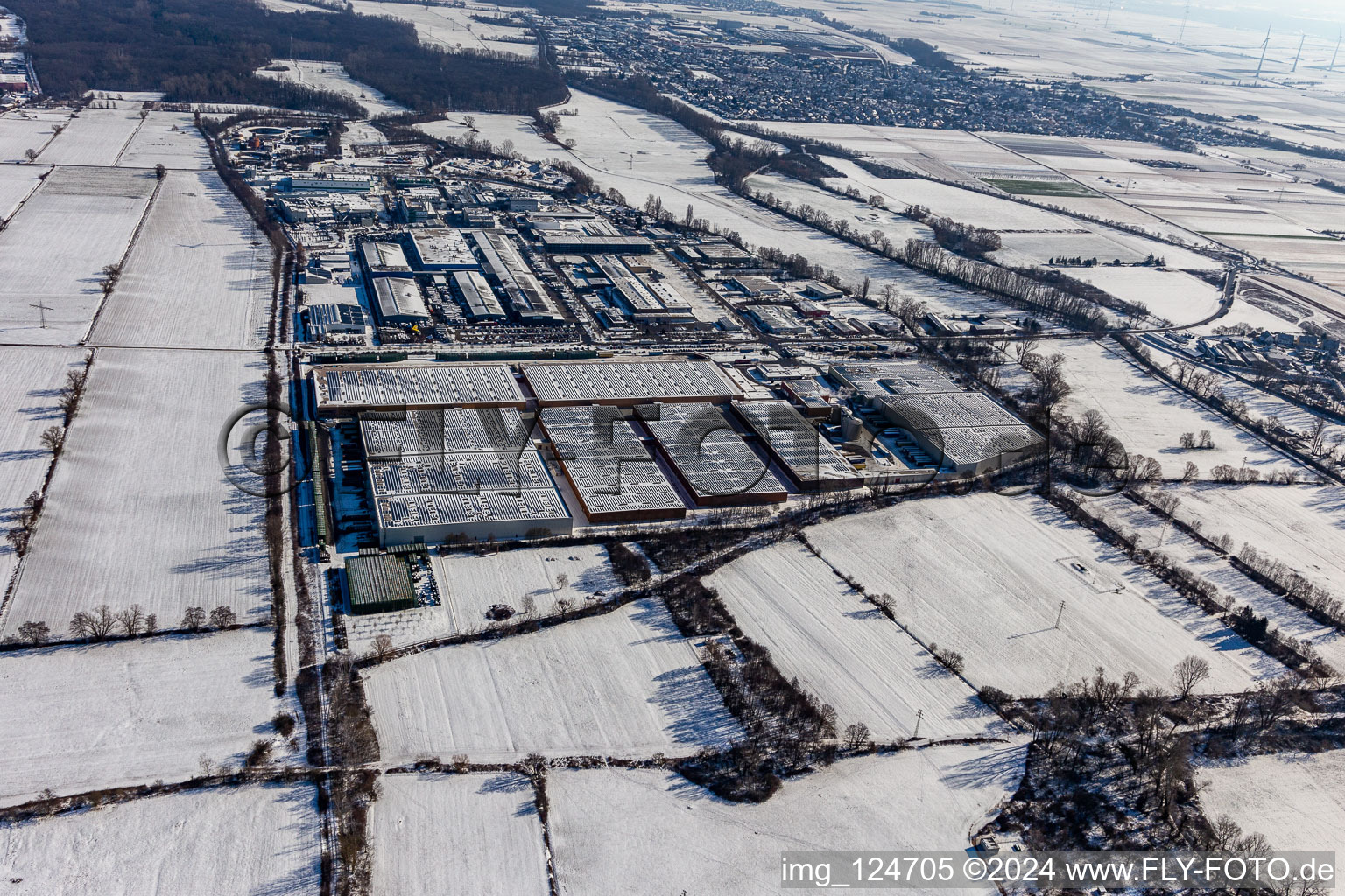 Winter aerial view in the snow Michelin tire factory in Landau in der Pfalz in the state Rhineland-Palatinate, Germany