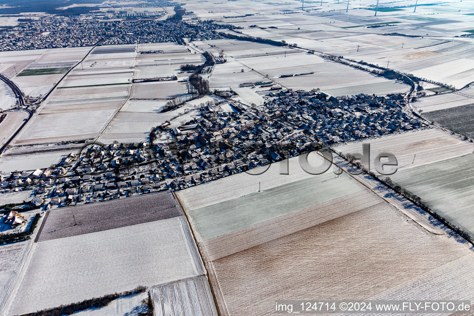 Winter aerial view in the snow in the district Mörlheim in Landau in der Pfalz in the state Rhineland-Palatinate, Germany