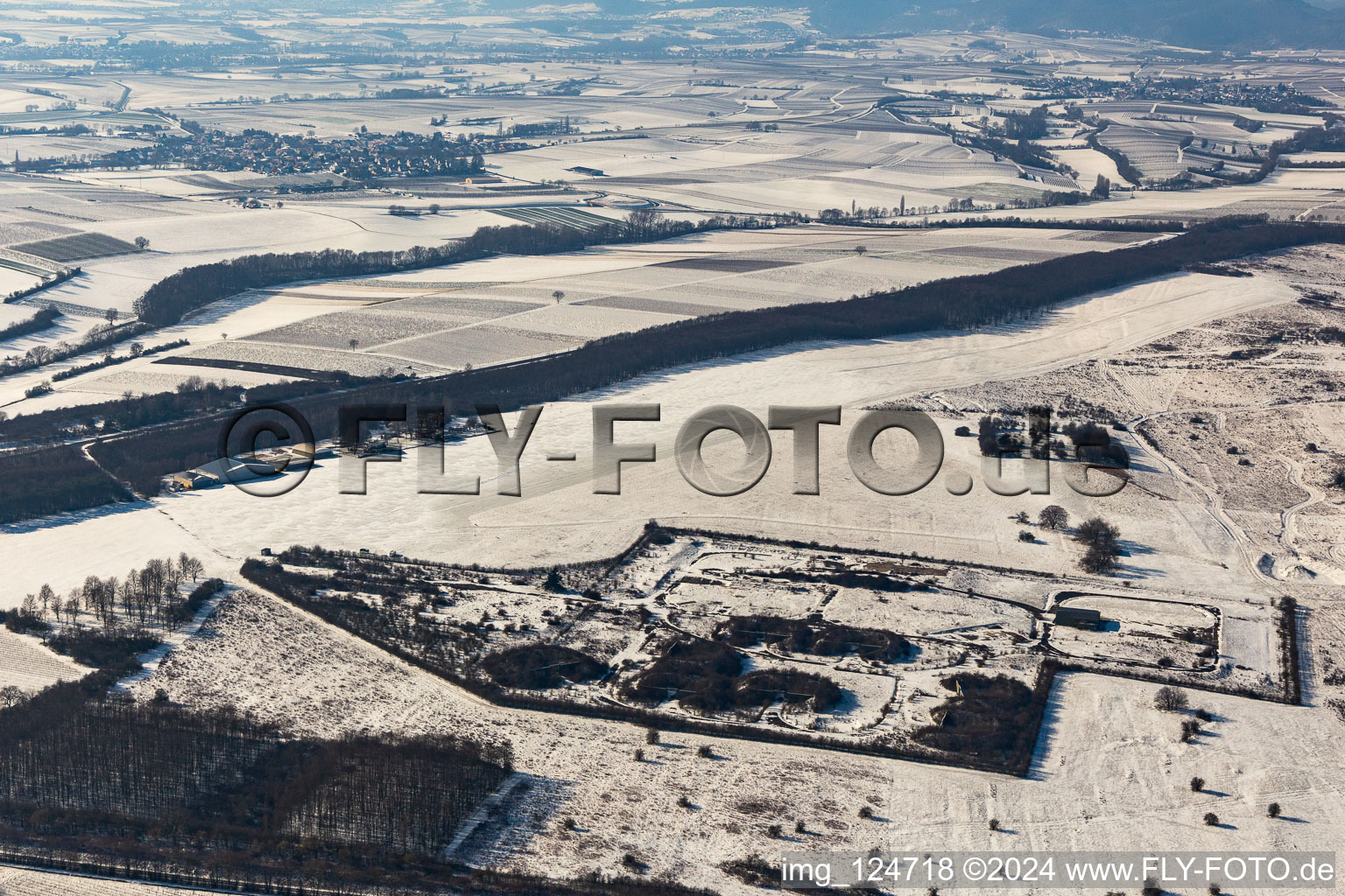 Winter aerial view in the snow Ebenberg airfield in Landau in der Pfalz in the state Rhineland-Palatinate, Germany