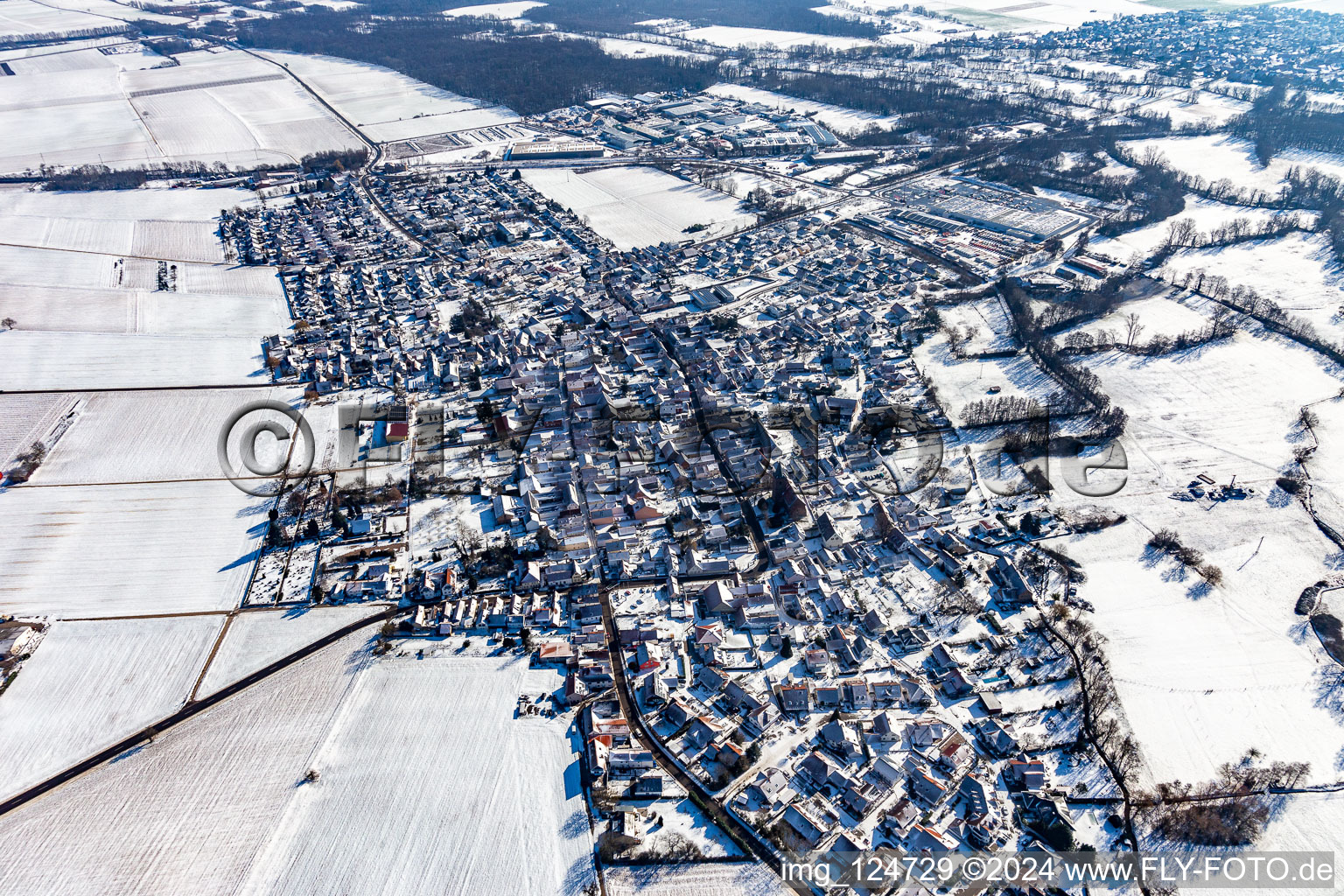 Winter aerial view in the snow in Rohrbach in the state Rhineland-Palatinate, Germany