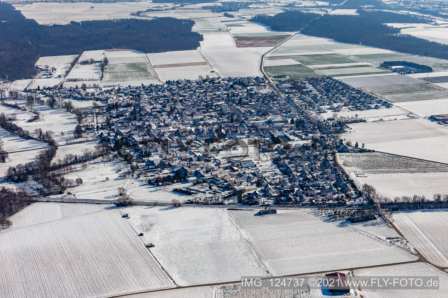 Winter aerial view in the snow in Steinweiler in the state Rhineland-Palatinate, Germany