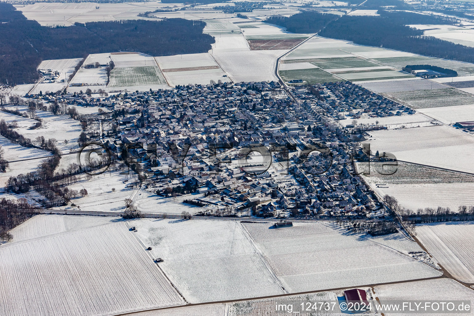 Winter aerial view in the snow in Steinweiler in the state Rhineland-Palatinate, Germany