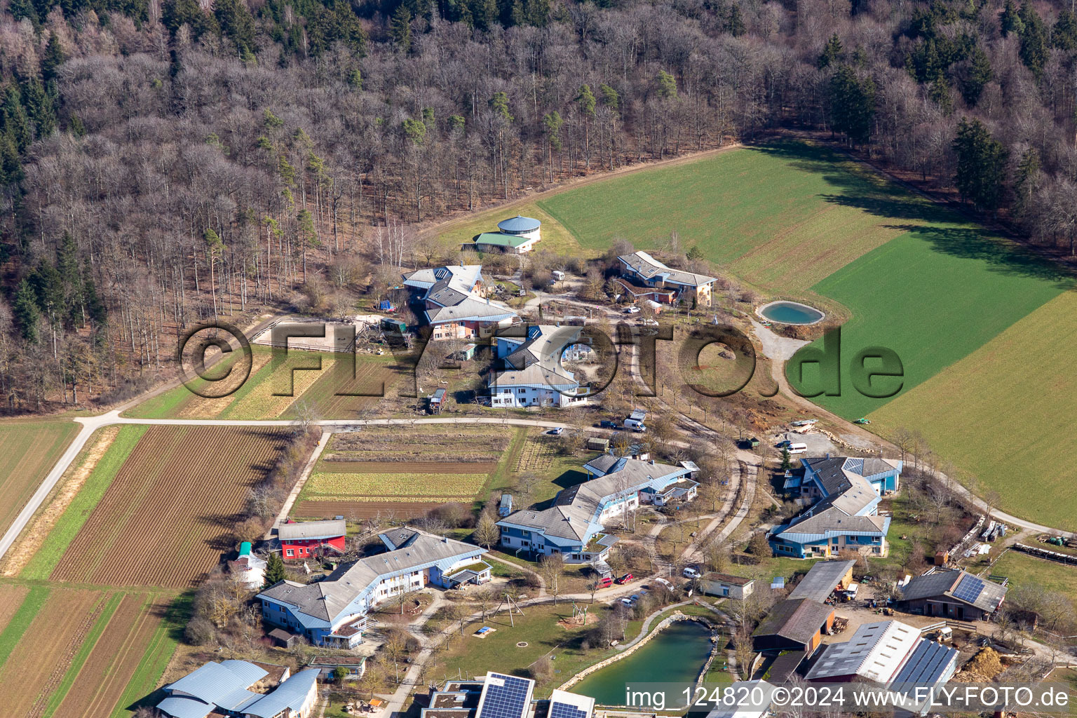 Aerial view of Village on the lake bank areas and Dorfgemeinschaft Tennental in Deckenpfronn in the state Baden-Wuerttemberg, Germany