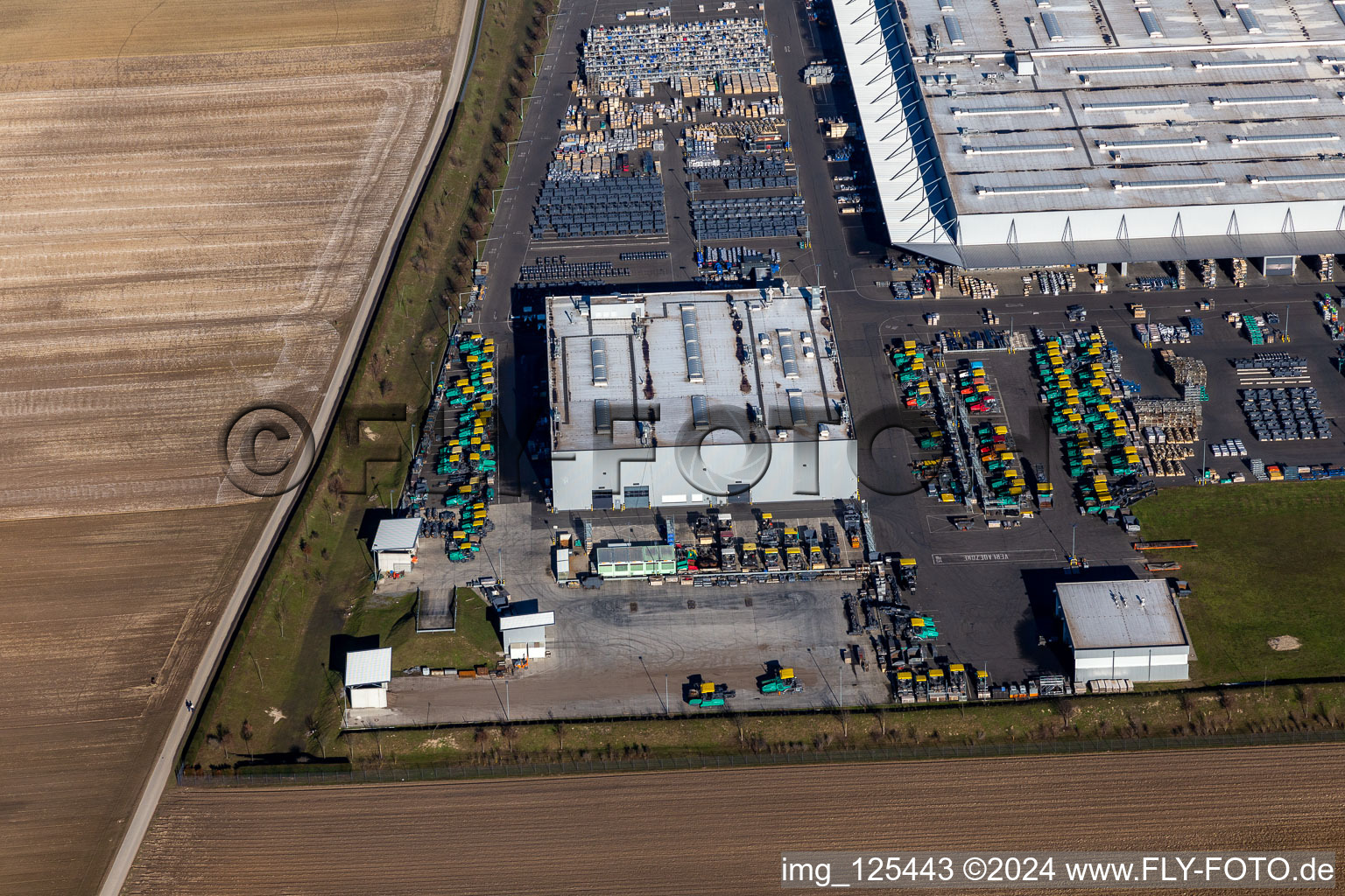 Aerial view of Buildings and production halls on the vehicle construction site of Joseph Voegele AG in the district Rheingoenheim in Ludwigshafen am Rhein in the state Rhineland-Palatinate, Germany