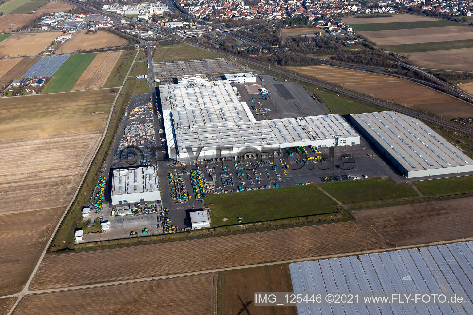 Buildings and production halls on the vehicle construction site of Joseph Voegele AG in the district Rheingoenheim in Ludwigshafen am Rhein in the state Rhineland-Palatinate, Germany from above