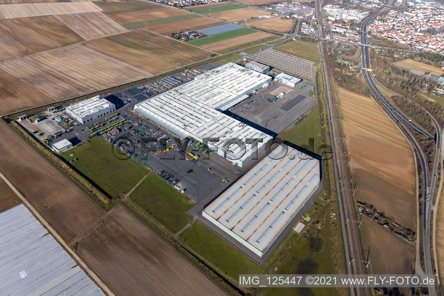 Buildings and production halls on the vehicle construction site of Joseph Voegele AG in the district Rheingoenheim in Ludwigshafen am Rhein in the state Rhineland-Palatinate, Germany out of the air