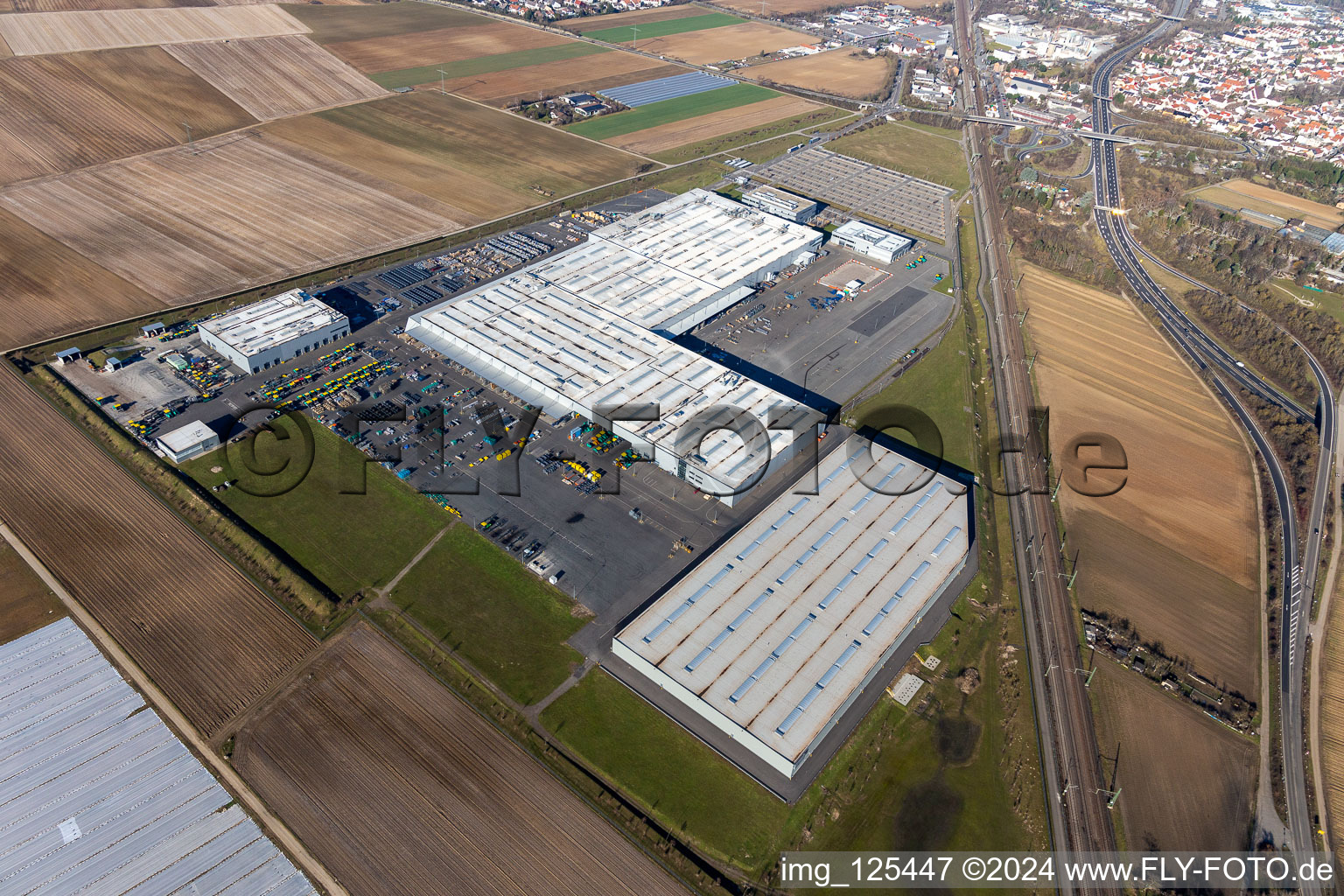 Buildings and production halls on the vehicle construction site of Joseph Voegele AG in the district Rheingoenheim in Ludwigshafen am Rhein in the state Rhineland-Palatinate, Germany out of the air