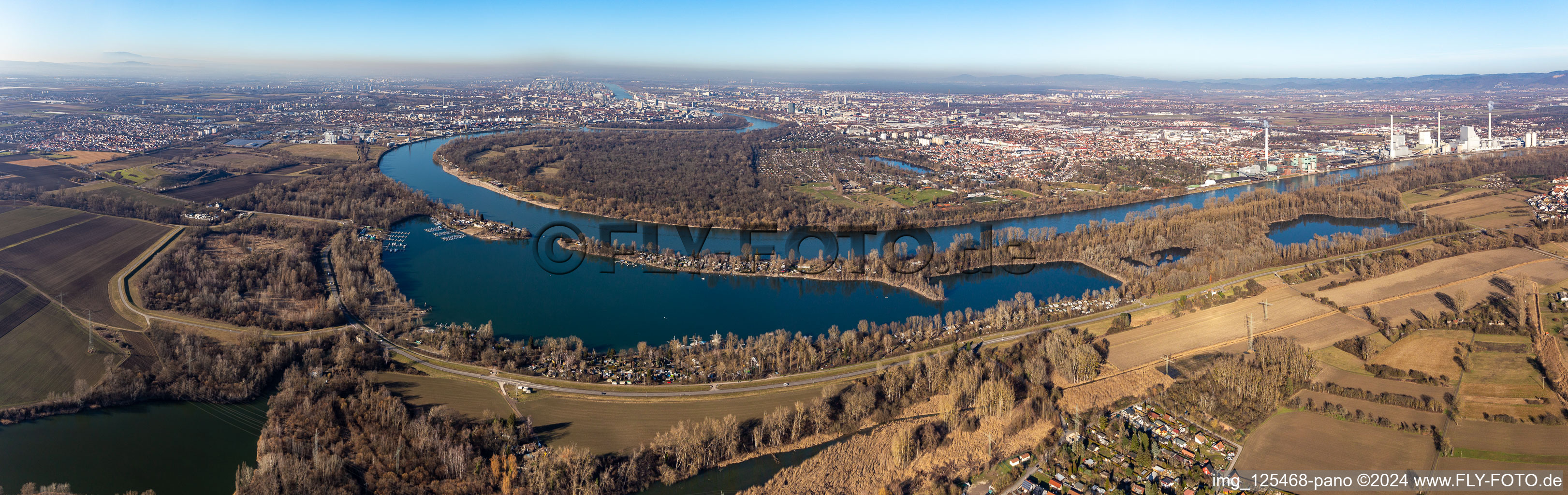 Panoramic perspective of curved loop of the riparian zones on the course of the river Rhine around the island "Reiss" near Neckarau in Mannheim in the state Baden-Wuerttemberg, Germany