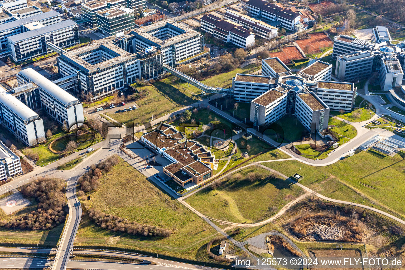 Aerial photograpy of Star-shaped office buildings of the SAP Deutschland SE & Co. KG at the forest edged in Walldorf in the state Baden-Wuerttemberg