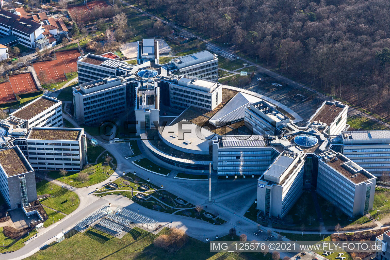 Oblique view of Star-shaped office buildings of the SAP Deutschland SE & Co. KG at the forest edged in Walldorf in the state Baden-Wuerttemberg