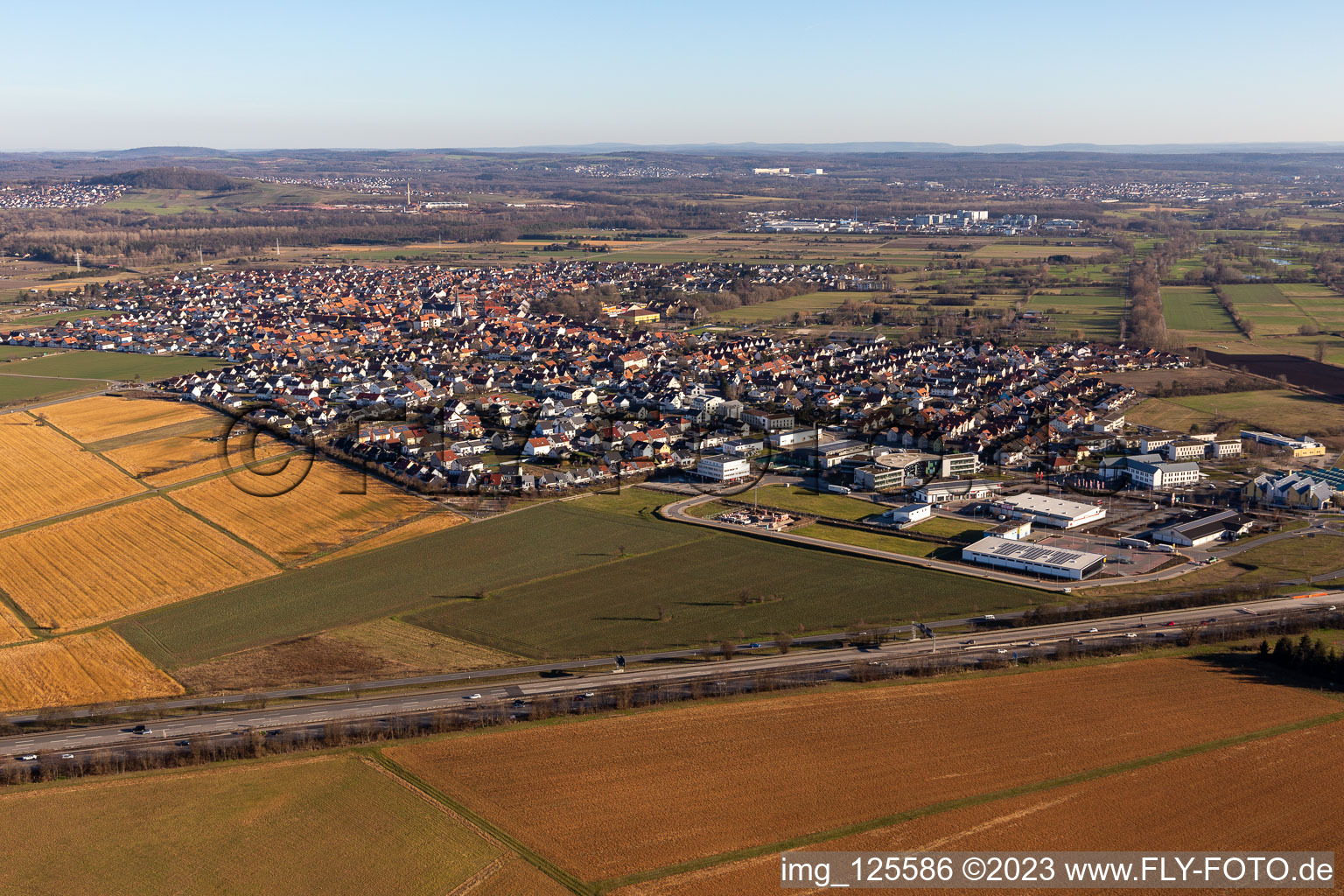 Village view on the edge of agricultural fields and land in the district Rot in Sankt Leon-Rot in the state Baden-Wuerttemberg, Germany