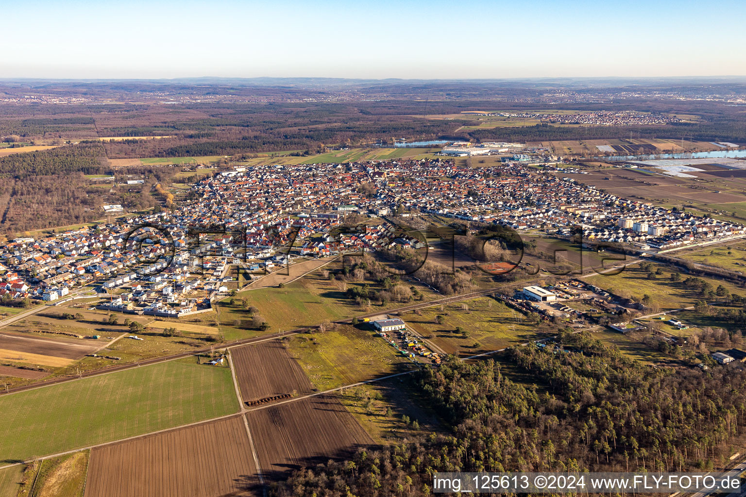 Village view on the edge of agricultural fields and land in Wiesental in the state Baden-Wuerttemberg, Germany