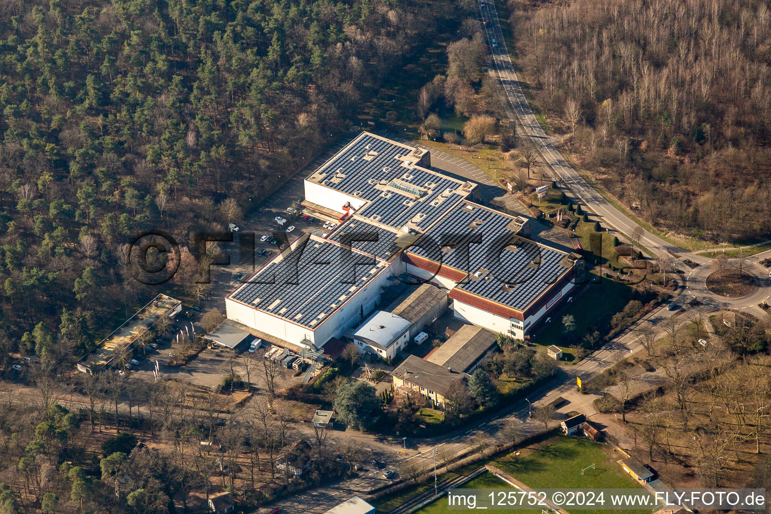 Aerial view of Building of the store - furniture market Ehrmann Herxheim in Herxheim bei Landau (Pfalz) in the state Rhineland-Palatinate, Germany