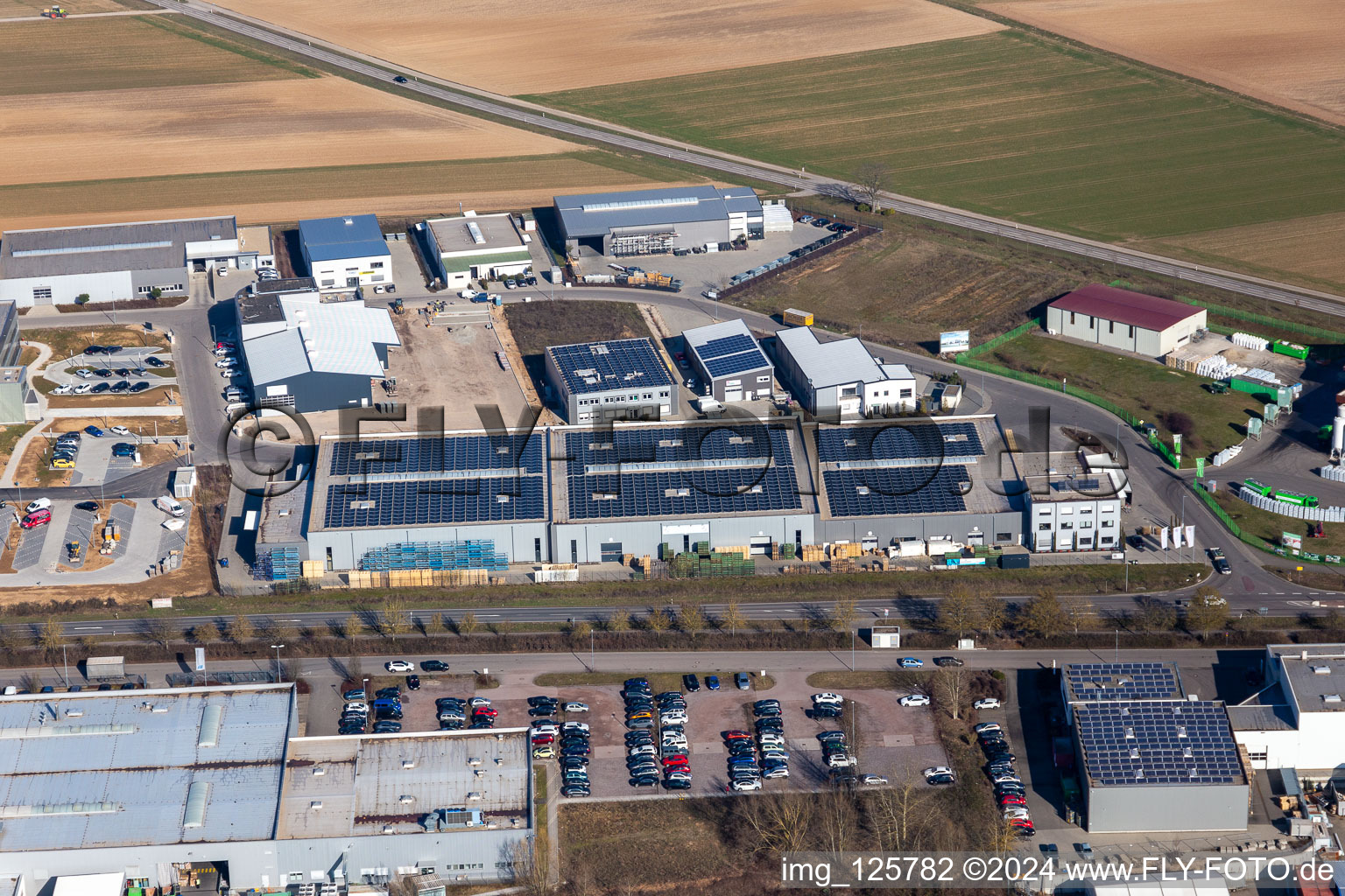 Industrial estate Gewerbepark West II with Ampco Pumps GmbH, Hellmann Grosshandel, Martin Dradrach Verpackungen, BioMyCel UG and Klarsicht-verpackungen Weber GmbH in Herxheim bei Landau (Pfalz) in the state Rhineland-Palatinate, Germany