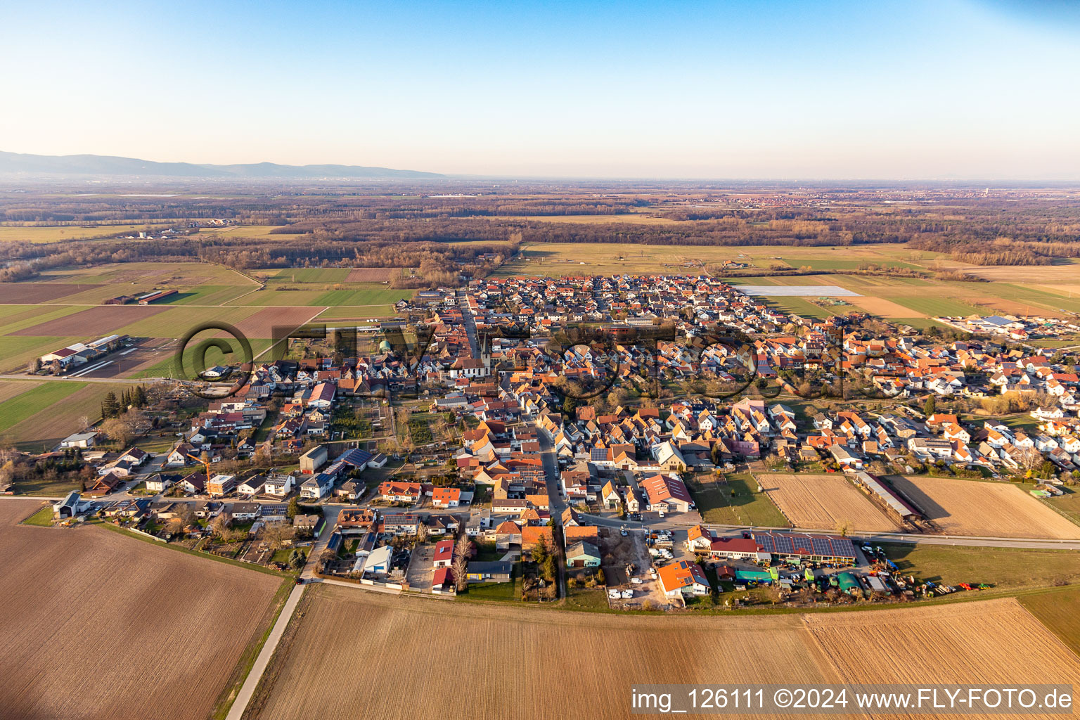 Aerial photograpy of Village - view on the edge of agricultural fields and farmland in Ottersheim bei Landau in the state Rhineland-Palatinate, Germany