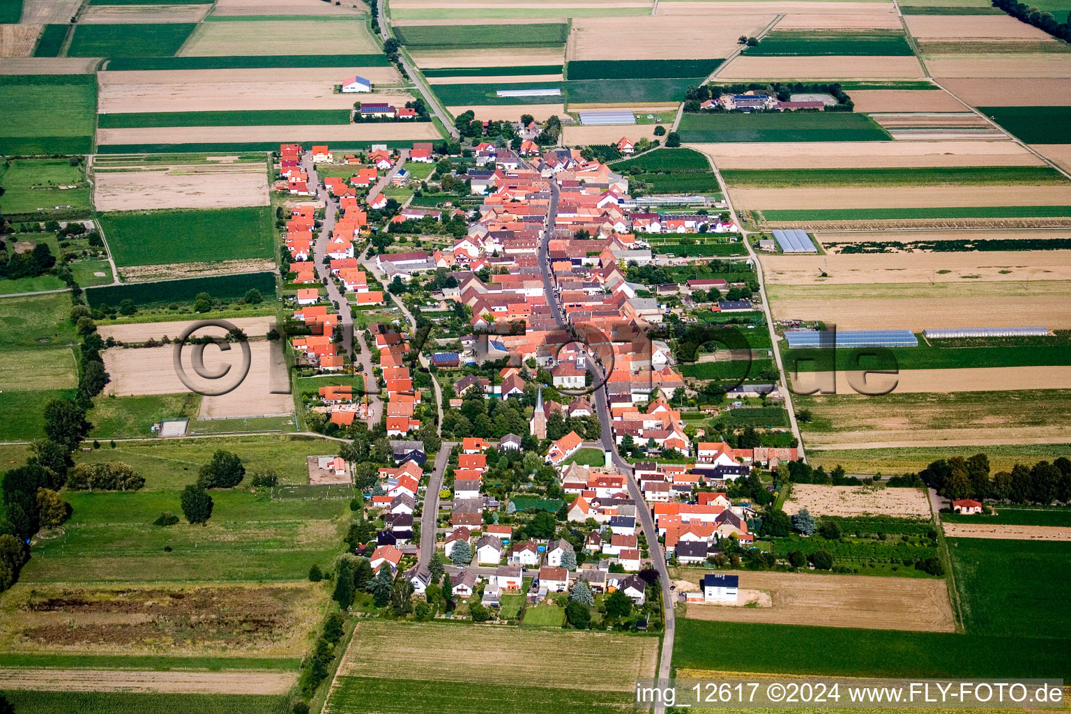 Town View of the streets and houses of the residential areas in Altdorf in the state Rhineland-Palatinate out of the air