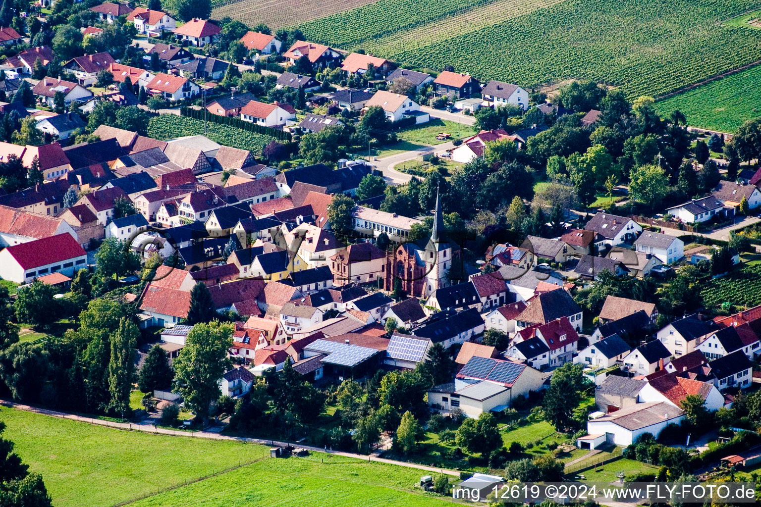 Town View of the streets and houses of the residential areas in Altdorf in the state Rhineland-Palatinate seen from above