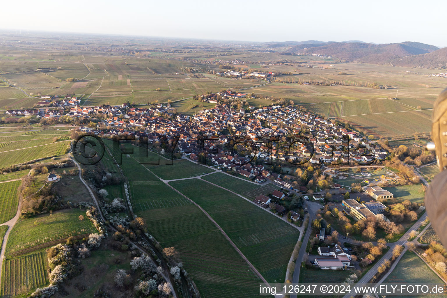 Aerial view of Chapel "Kleine Kalmit" in the Kleine Kalmit nature reserve on Easter morning with spring blossom in Ilbesheim bei Landau in der Pfalz in the state Rhineland-Palatinate, Germany