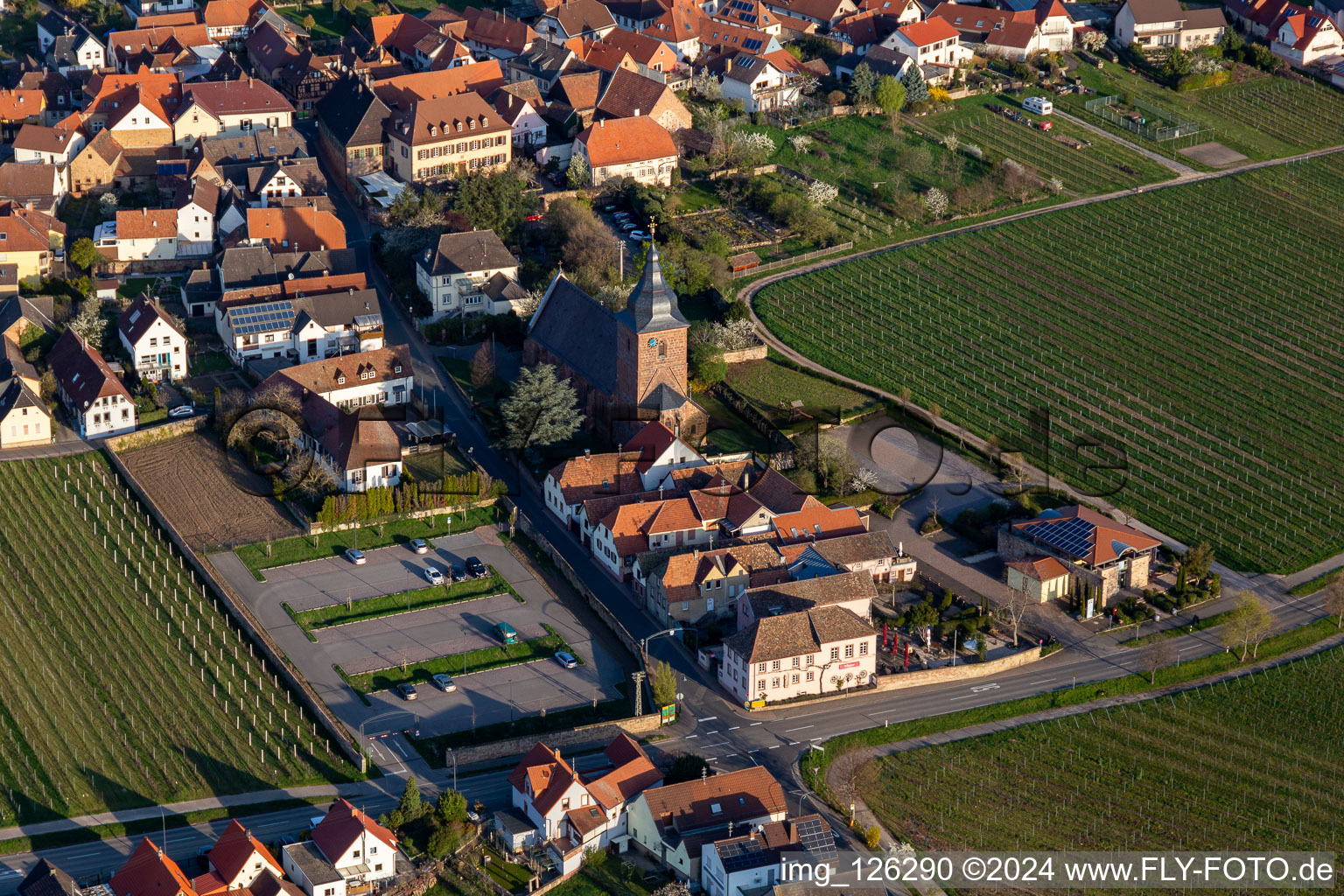 Church building of Catholic parish church of the Visitation of Mary, the wine house Vinothek Messmer, Ritterhof zur Rose in Burrweiler in the state Rhineland-Palatinate, Germany