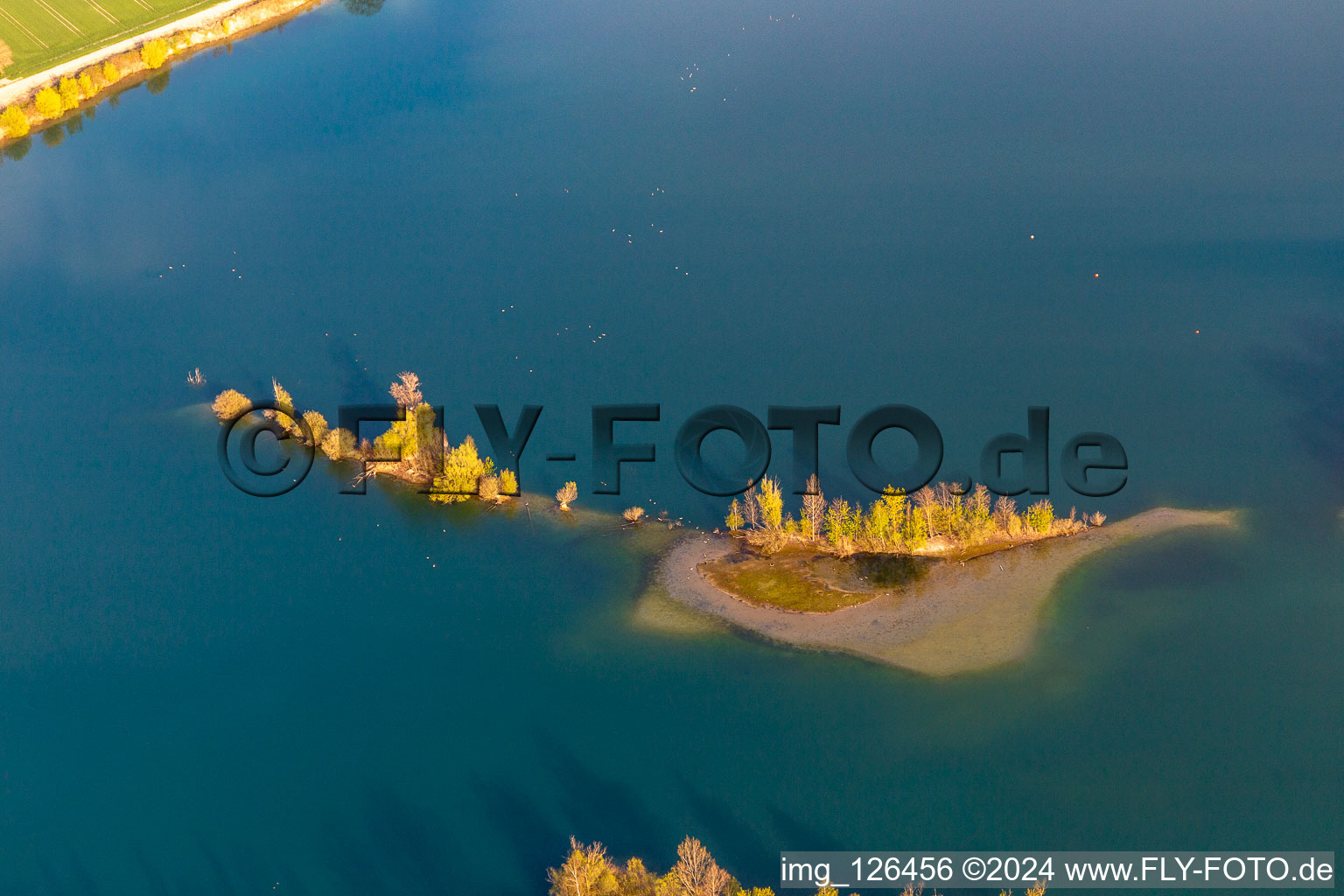 Gravel pond of the Wolf gravel works with floating photovoltaic system in Leimersheim in the state Rhineland-Palatinate, Germany