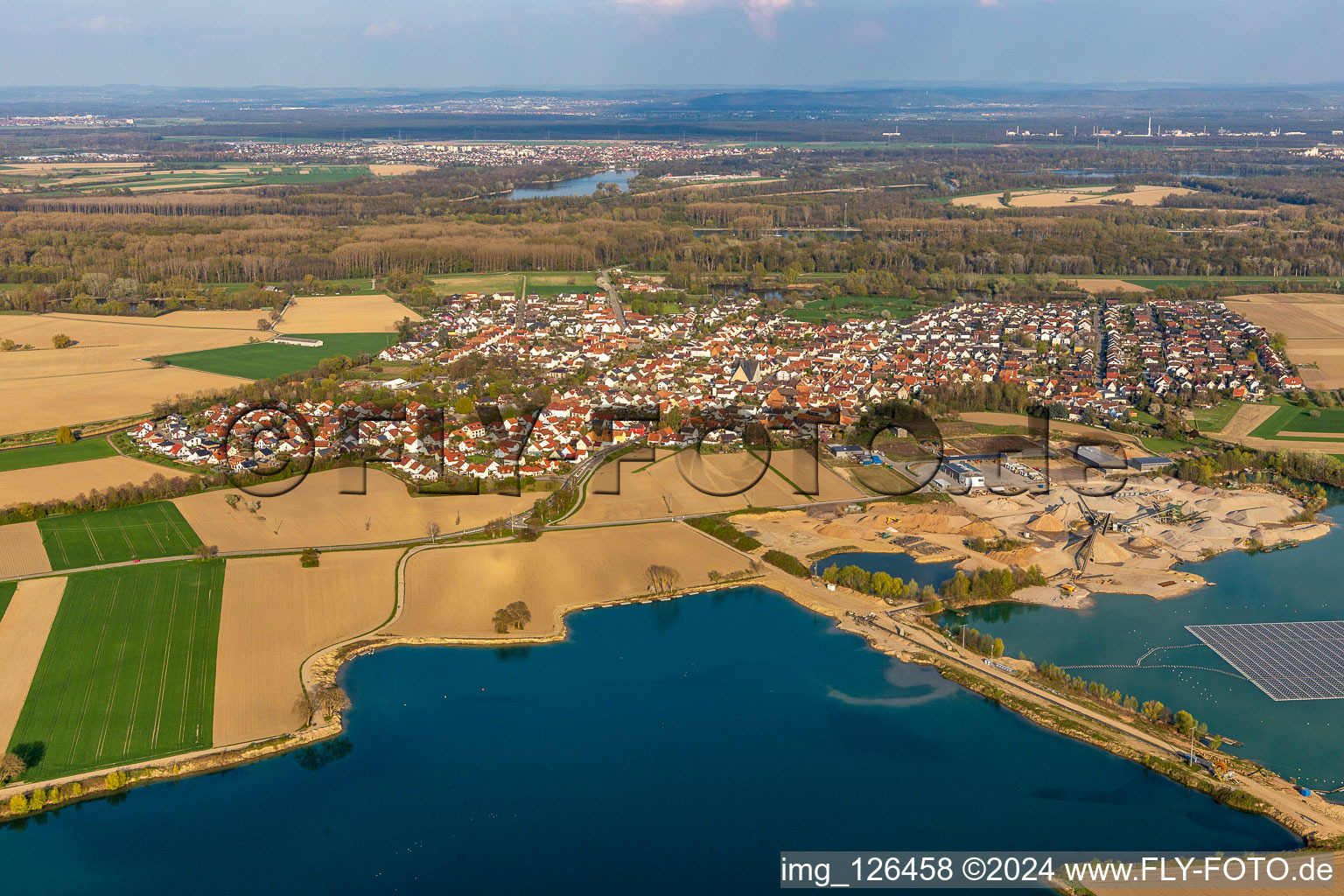 Village on the banks of the area lake of Baggersee in Leimersheim in the state Rhineland-Palatinate, Germany