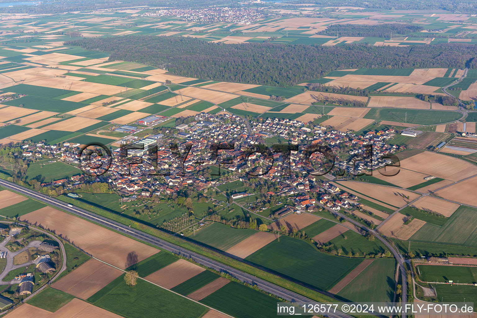 Village - view on the edge of agricultural fields and farmland in Kuerzell in the state Baden-Wurttemberg, Germany