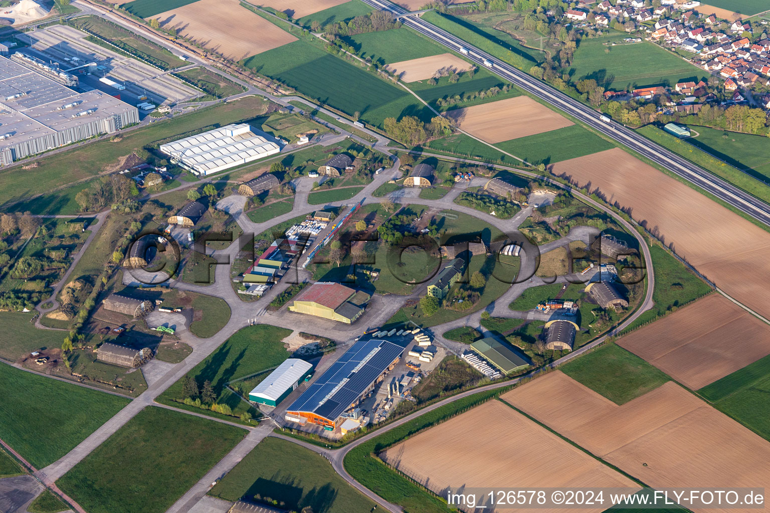 Concrete shelters and former airfield hangars with arch cover in today's commercial area in Lahr / Black Forest in the state Baden-Wuerttemberg, Germany