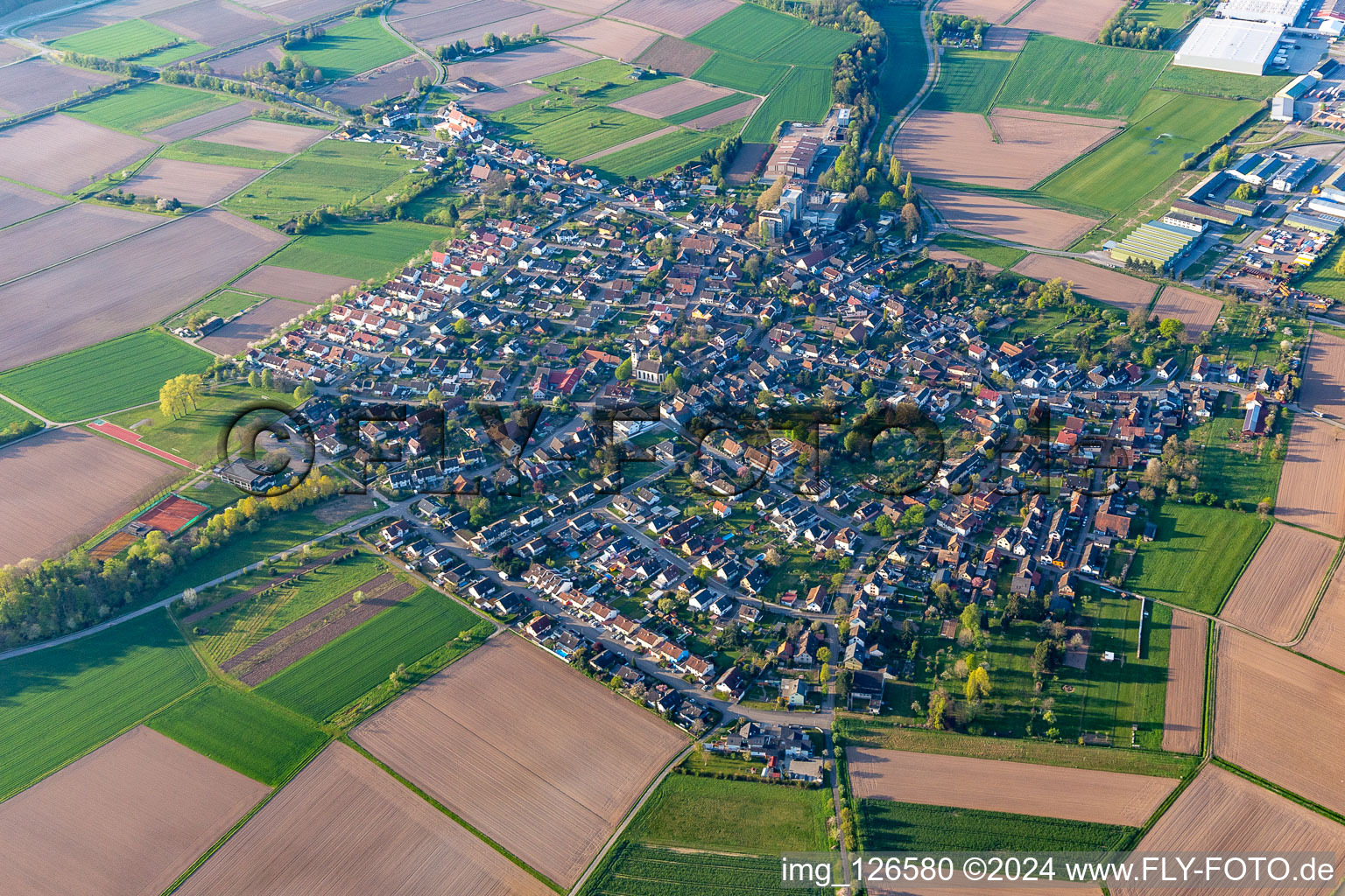 Village view on the edge of agricultural fields and land in Hugsweier in the state Baden-Wuerttemberg, Germany