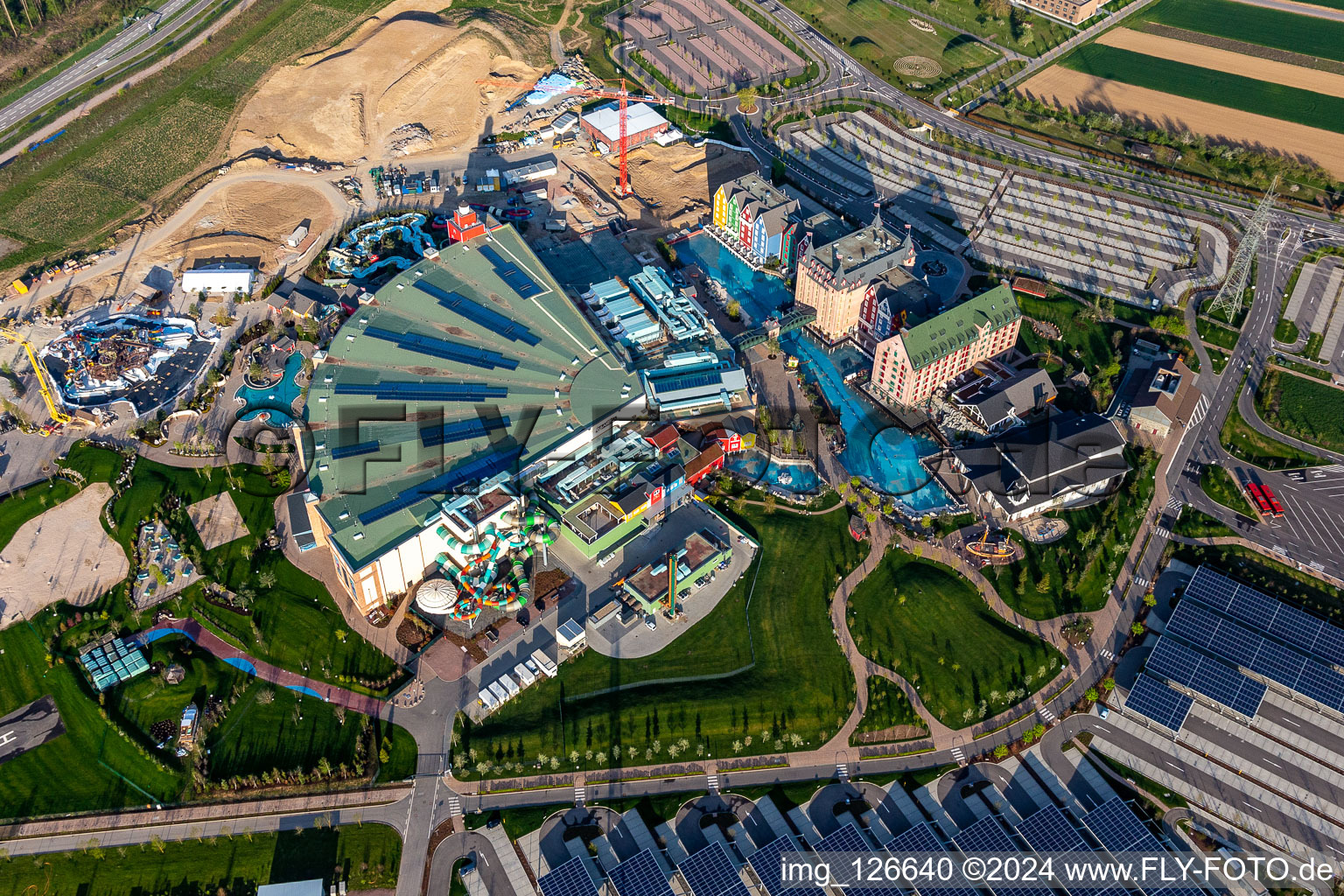 Aerial photograpy of Extension construction site for the Water park "Rulantica" and museum hotel Kronasar on the grounds of the locked down amusement park "Europapark" in Rust in the state of Baden-Wuerttemberg, Germany