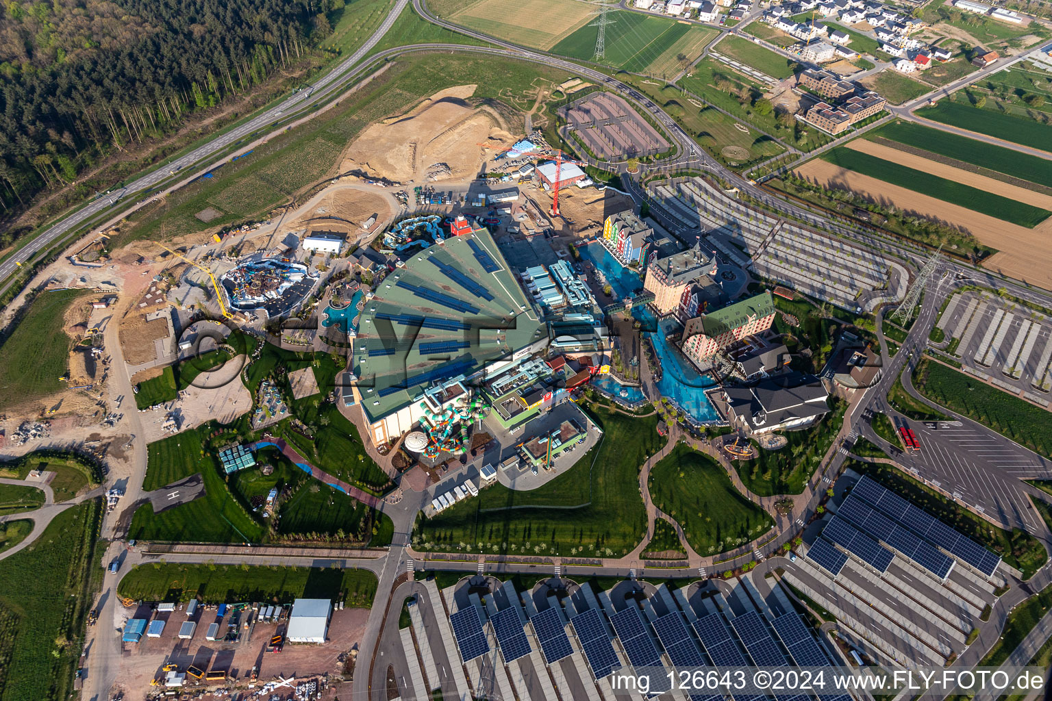 Oblique view of Extension construction site for the Water park "Rulantica" and museum hotel Kronasar on the grounds of the locked down amusement park "Europapark" in Rust in the state of Baden-Wuerttemberg, Germany