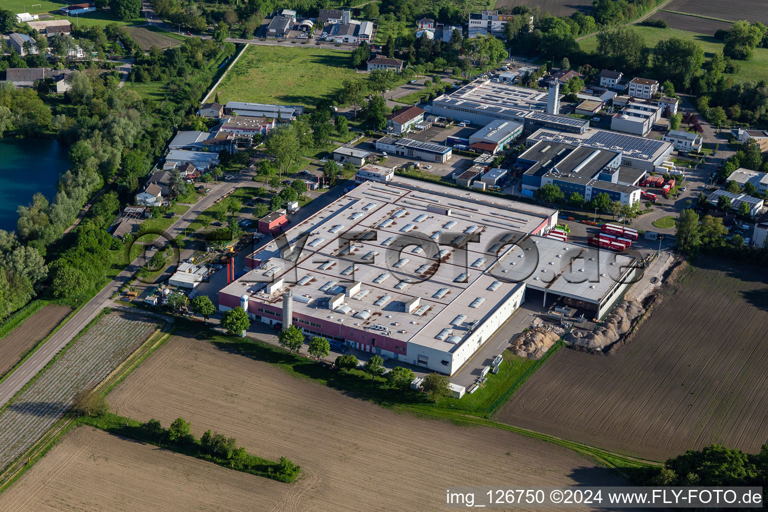 Aerial photograpy of Building and production halls on the premises of Coca-Cola European Partners Deutschland GmbH in Neureut in the state Baden-Wuerttemberg, Germany