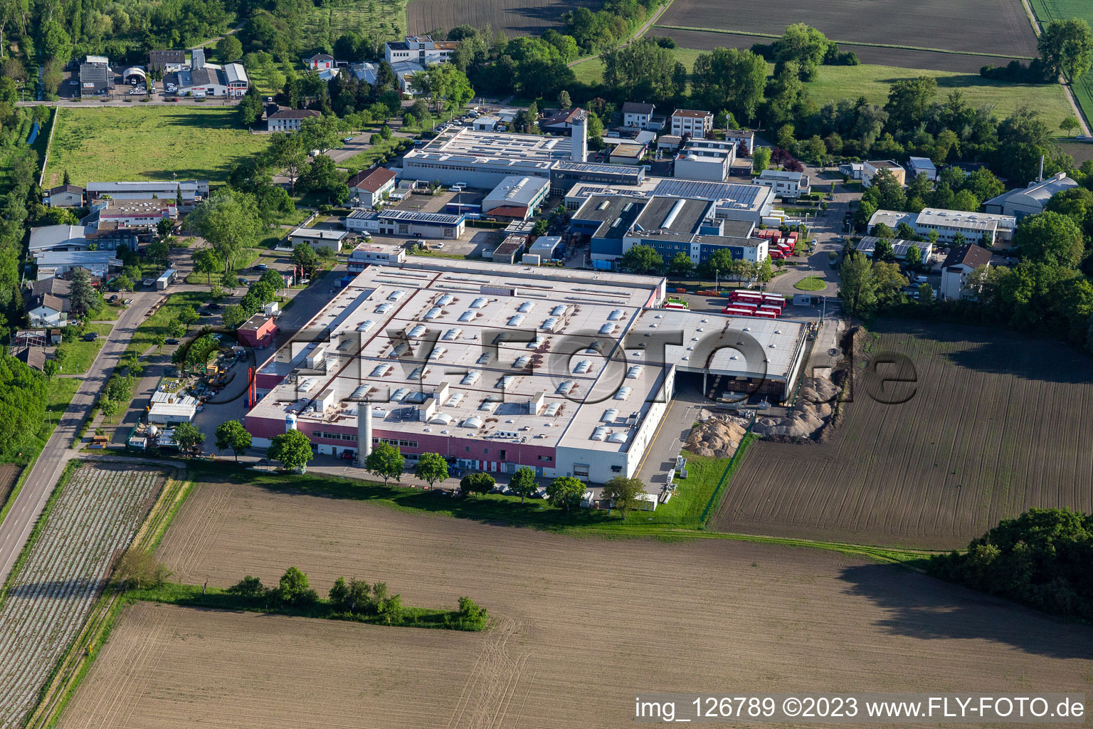 Building and production halls on the premises of Coca-Cola European Partners Deutschland GmbH in Neureut in the state Baden-Wuerttemberg, Germany from above