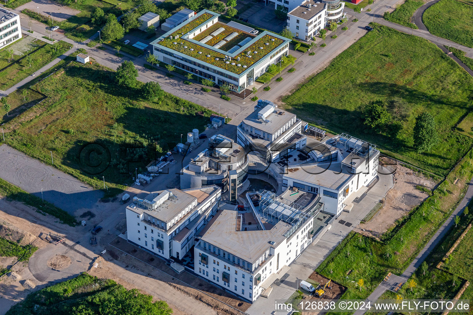 Aerial photograpy of Construction site for the new building of a research building and office complex on street Wilhelm-Schickard-Strasse in the technology-park Karlsruhe in Karlsruhe in the state Baden-Wuerttemberg, Germany