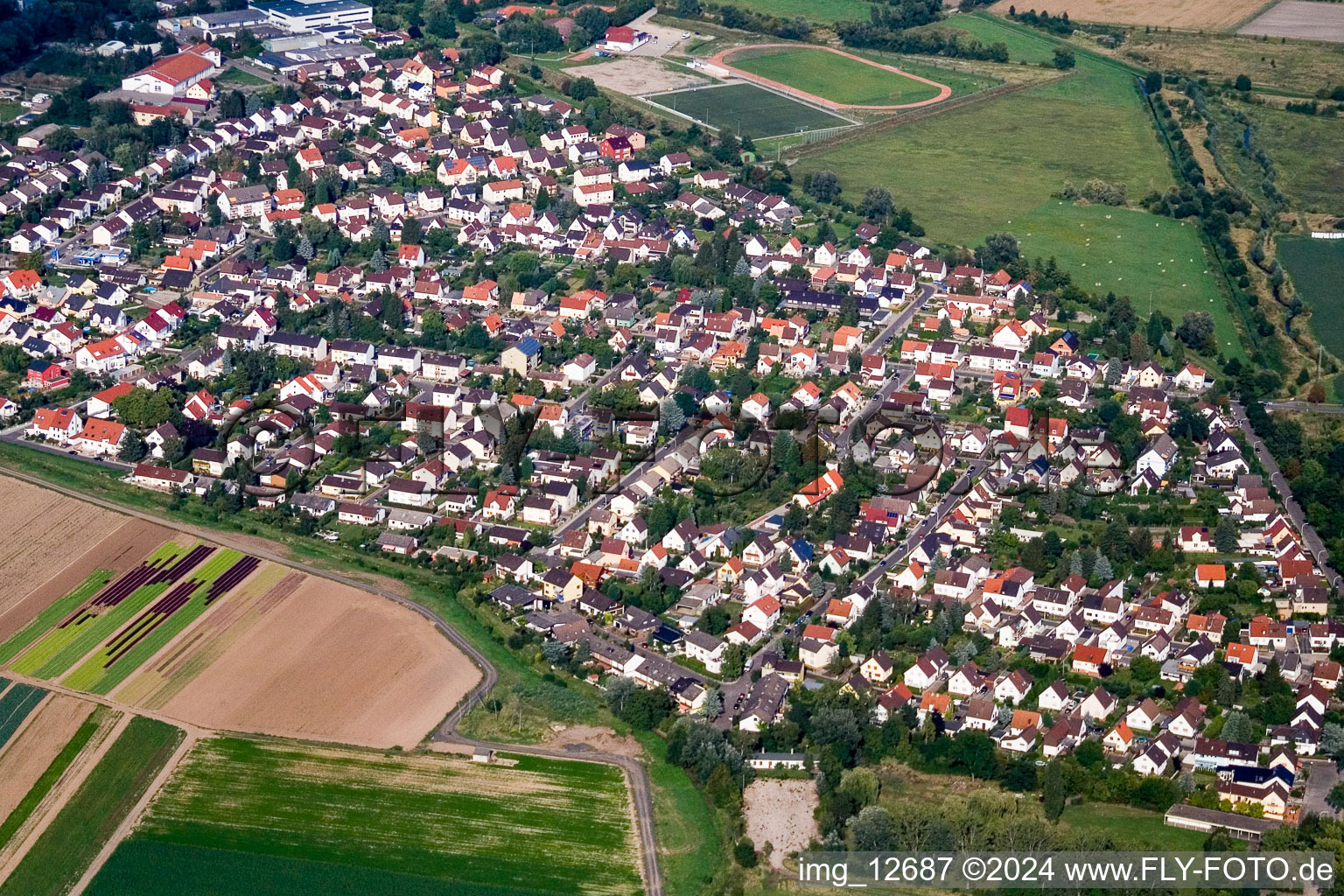 Aerial view of Town View of the streets and houses of the residential areas in Lambsheim in the state Rhineland-Palatinate