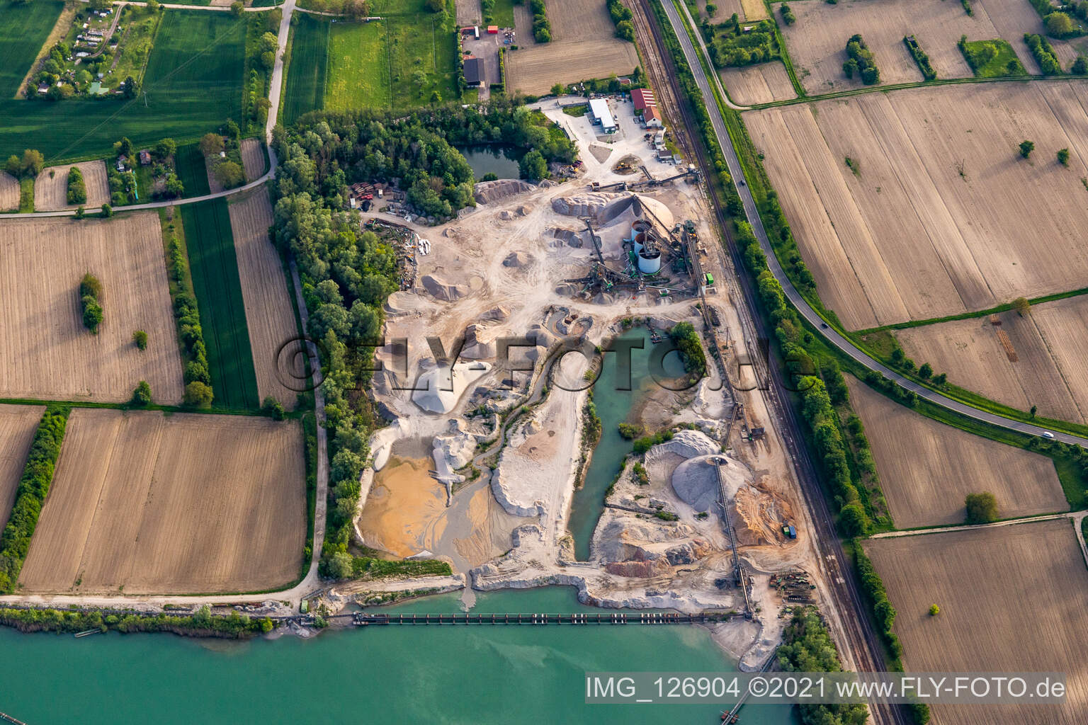 Aerial view of HBM Hagenbacher Bau minerals quarry lake in Hagenbach in the state Rhineland-Palatinate, Germany