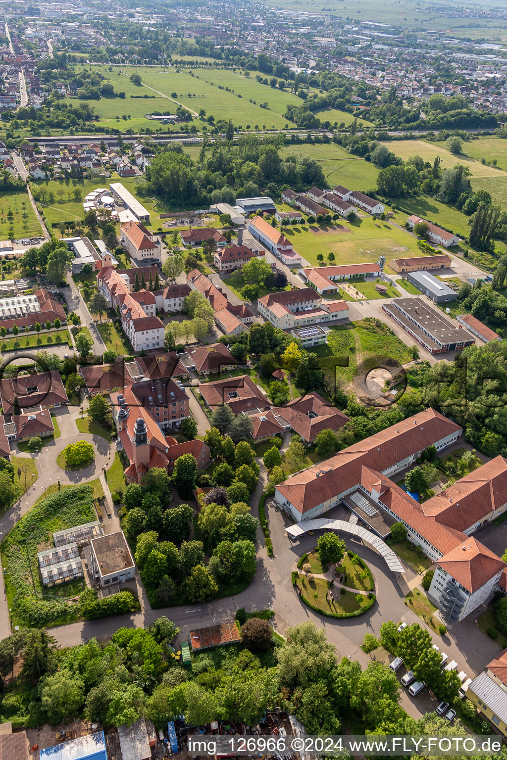 Aerial view of Building of the retirement home Caritas Foerderzentrum St. Laurentius and Paulus and of the Jugendwerk St. Josef in the district Queichheim in Landau in der Pfalz in the state Rhineland-Palatinate, Germany