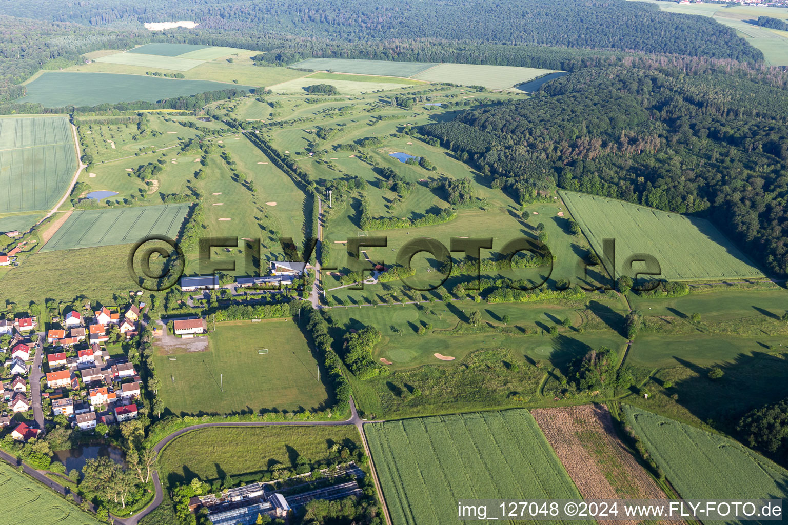 Aerial view of Grounds of the Golf course at of Golfclubs Schweinfurt e.V. in the district Loeffelsterz in Schonungen in the state Bavaria, Germany