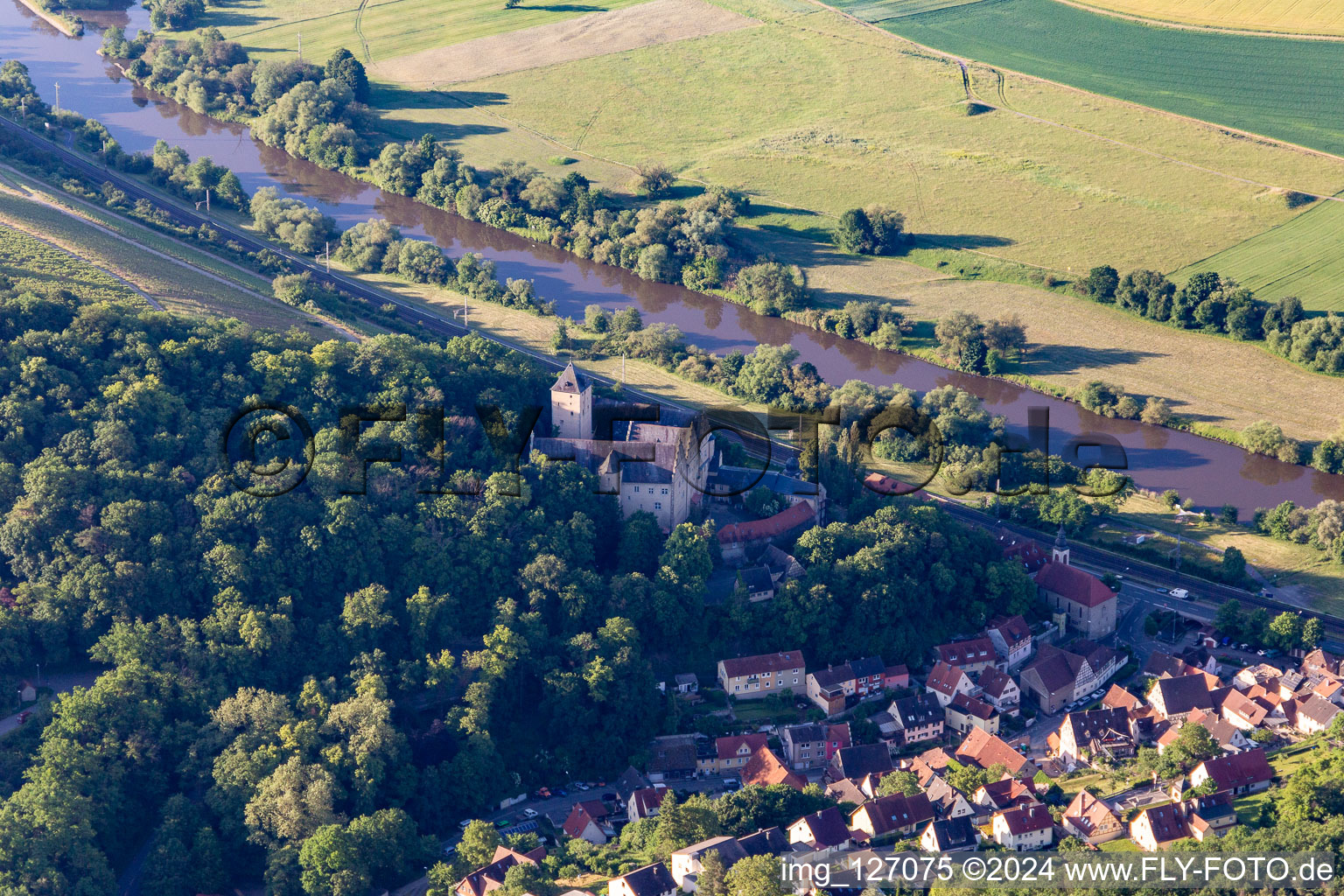 Castle Mainberg in the district Mainberg in Schonungen in the state Bavaria, Germany from the plane