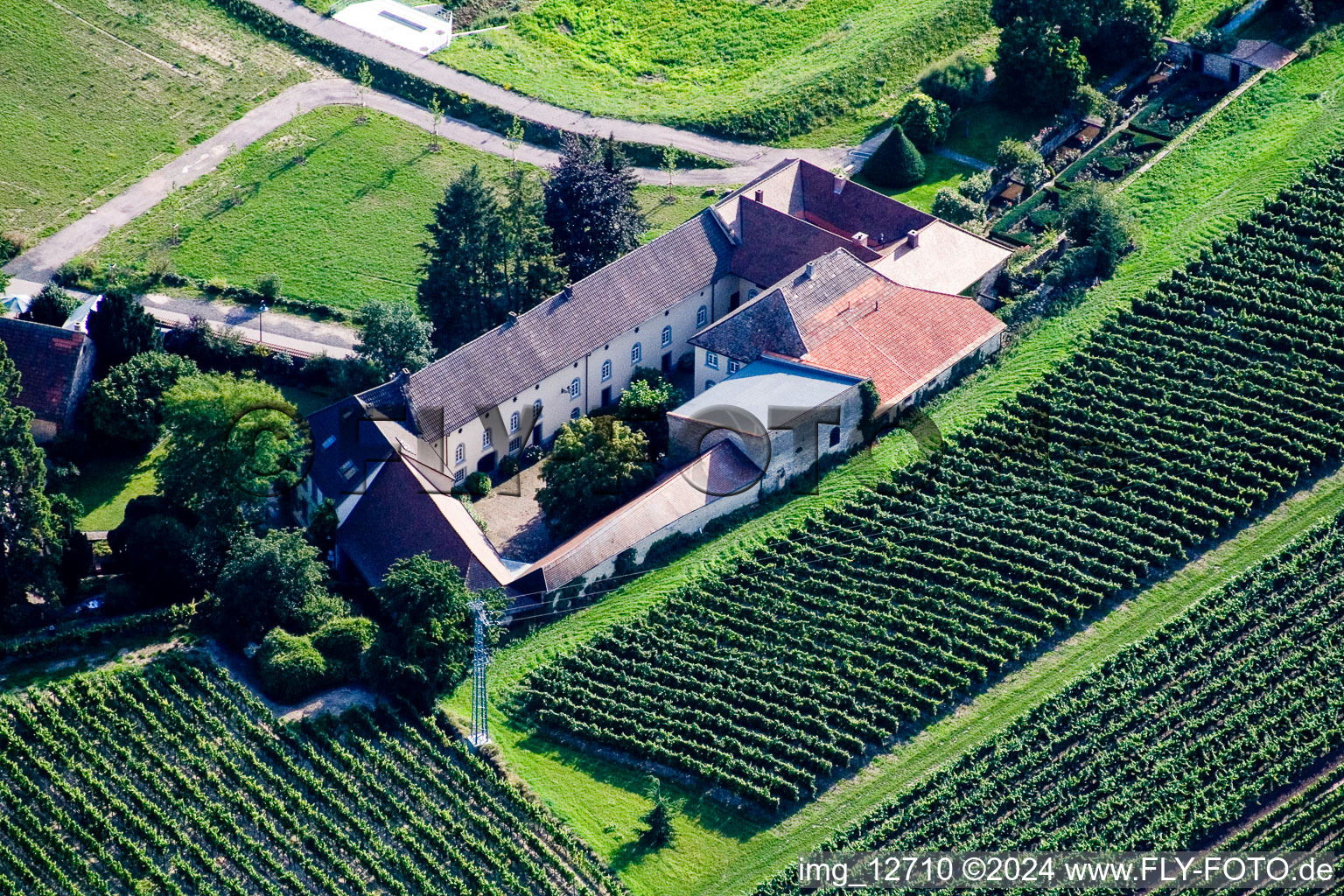 Former mill on the edge of cultivated fields in Grosskarlbach in the state Rhineland-Palatinate