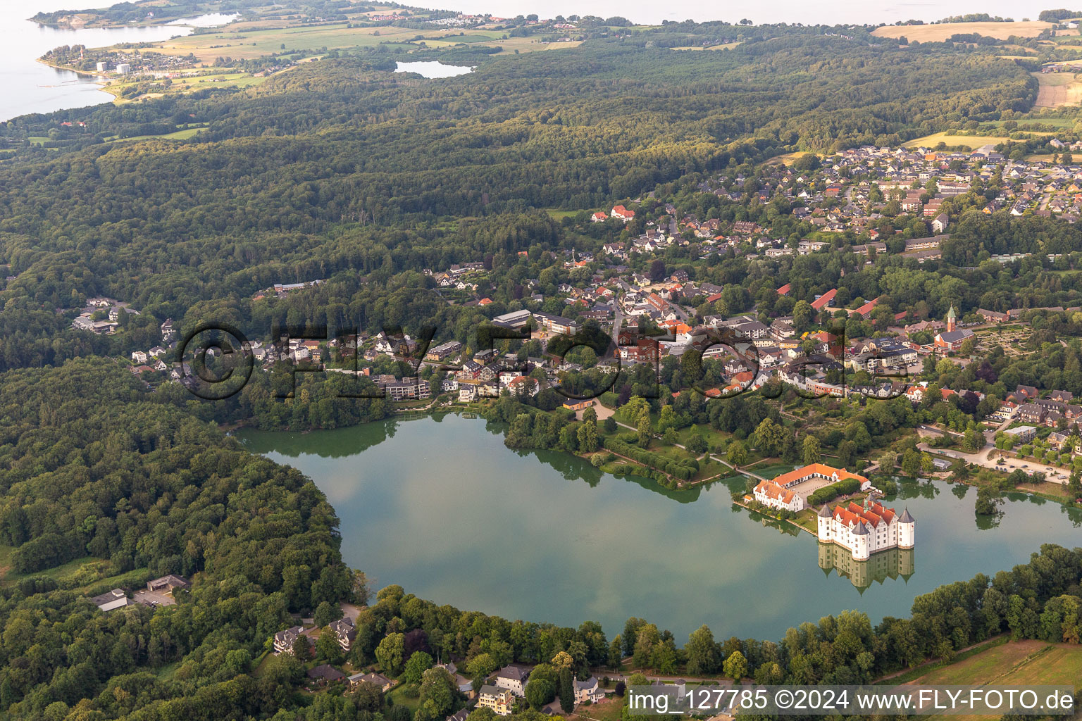 Oblique view of Castle Glücksburg in the castle pond in the district Ulstrupfeld in Glücksburg in the state Schleswig Holstein, Germany