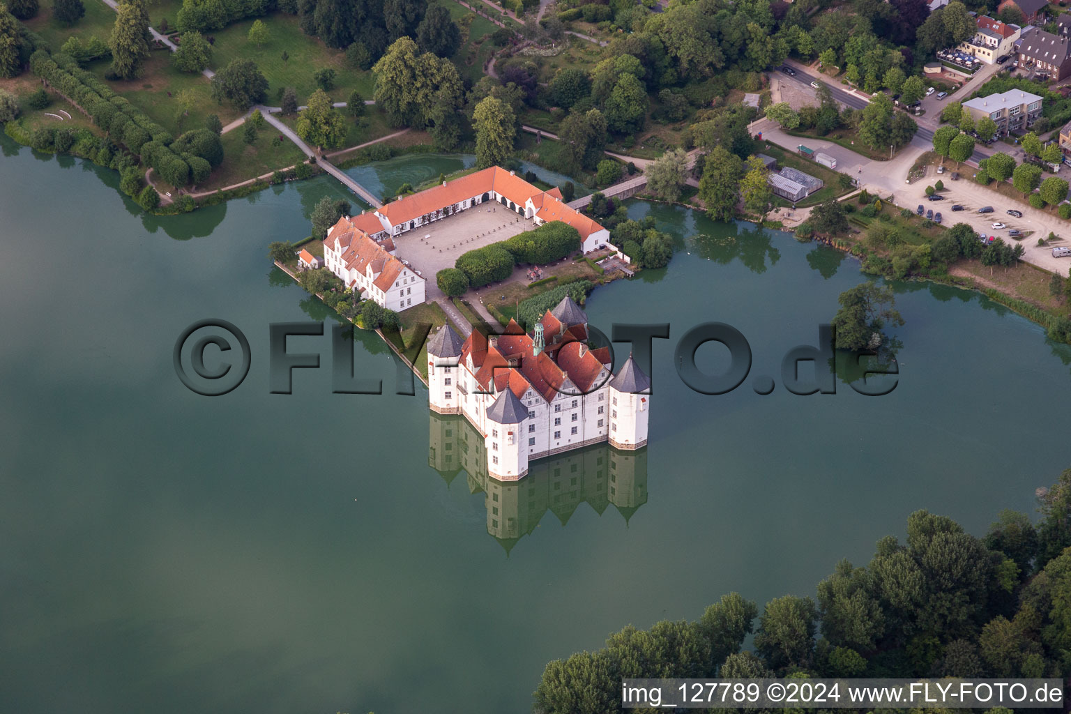 Castle Glücksburg in the castle pond in the district Ulstrupfeld in Glücksburg in the state Schleswig Holstein, Germany from above