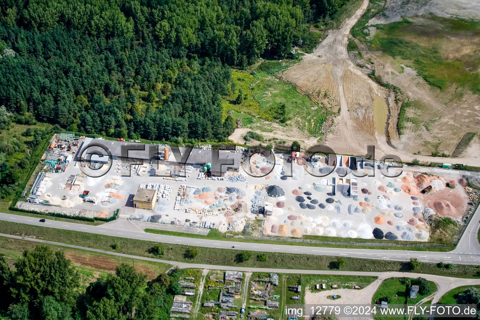 Aerial view of Garden gravel company, Badische Terrazzo Handelsgesellschaft mbH Huttenheimer Landstrasse 2-6 in the district Neudorf in Graben-Neudorf in the state Baden-Wuerttemberg, Germany