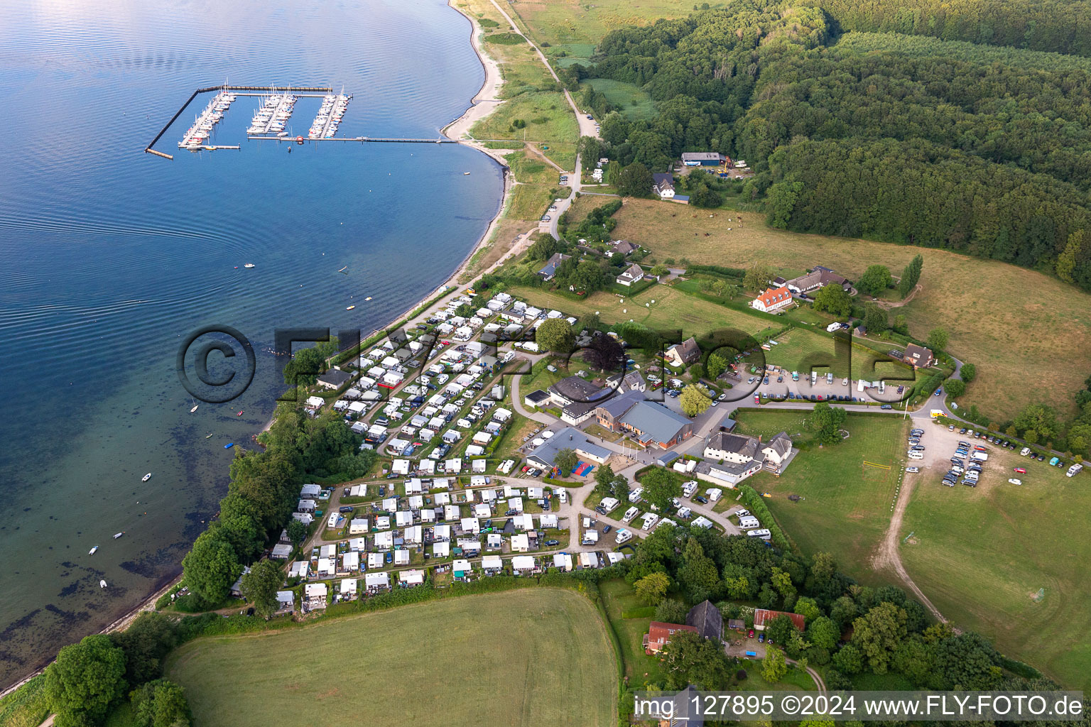 Aerial view of Camping-place Bockholmwik Pleasure boat and sailing boat mooring and boat moorings in the harbor " Yachthafen Bockholmwik " in Munkbrarup in the state Schleswig-Holstein, Germany