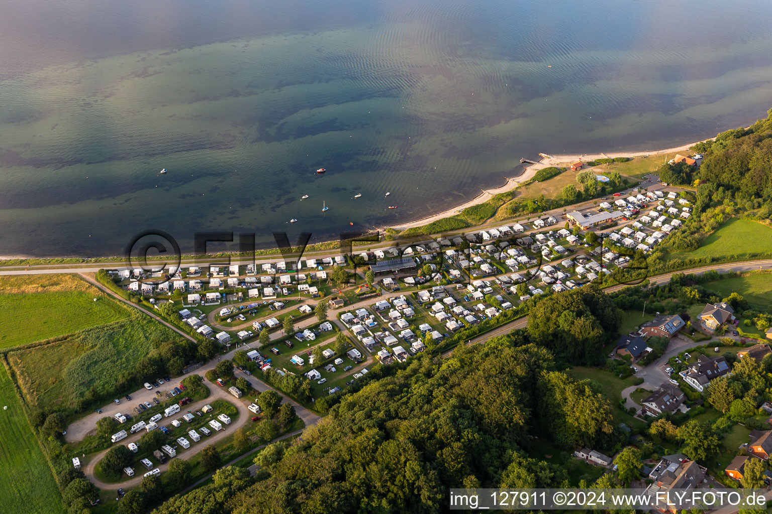 Camping with caravans and tents at the Baltic beach in Langballigholz in Schleswig-Holstein