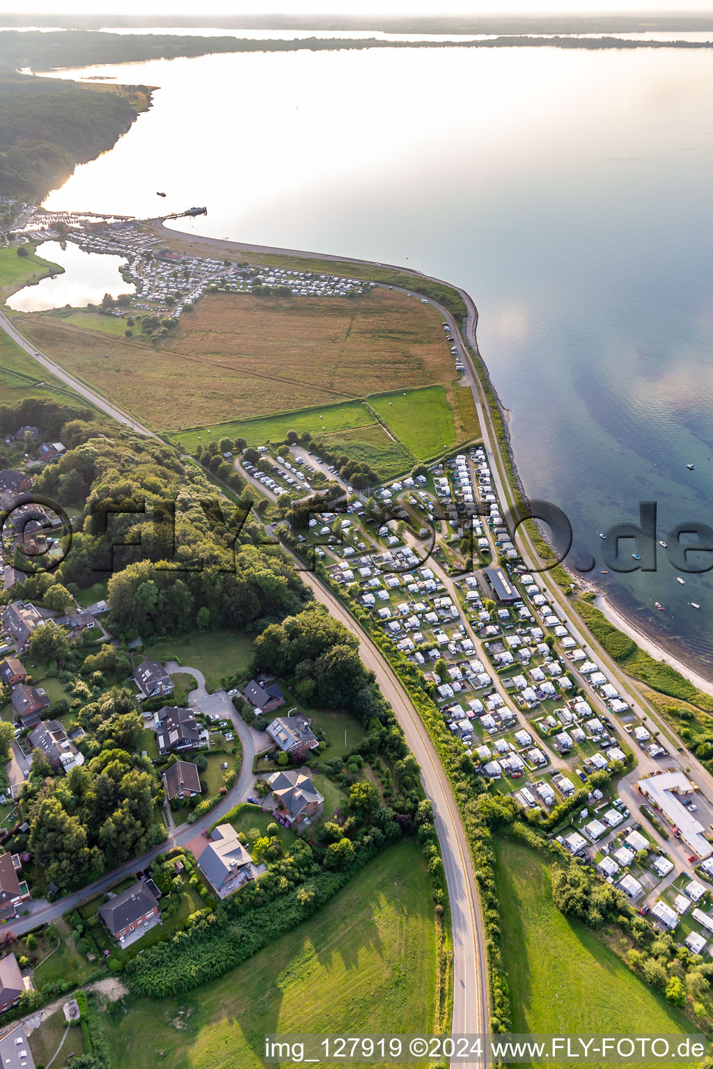 Aerial view of Camping with caravans and tents at the Baltic beach in Langballigholz in Schleswig-Holstein