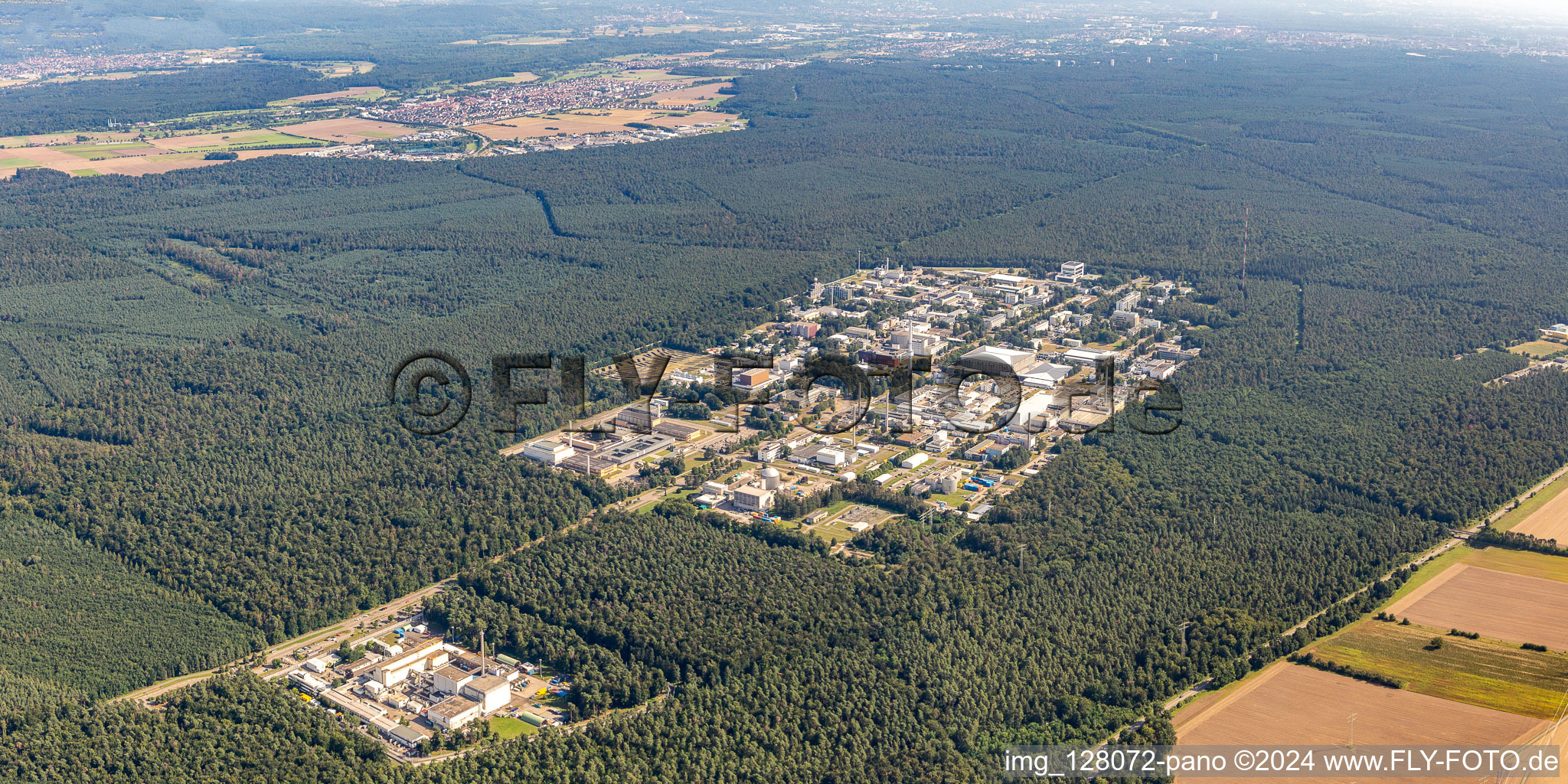 Research building and office complex of KIT Campus North (former Kernforschungszentrum Karlsruhe) in the district Leopoldshafen in Eggenstein-Leopoldshafen in the state Baden-Wuerttemberg from the plane