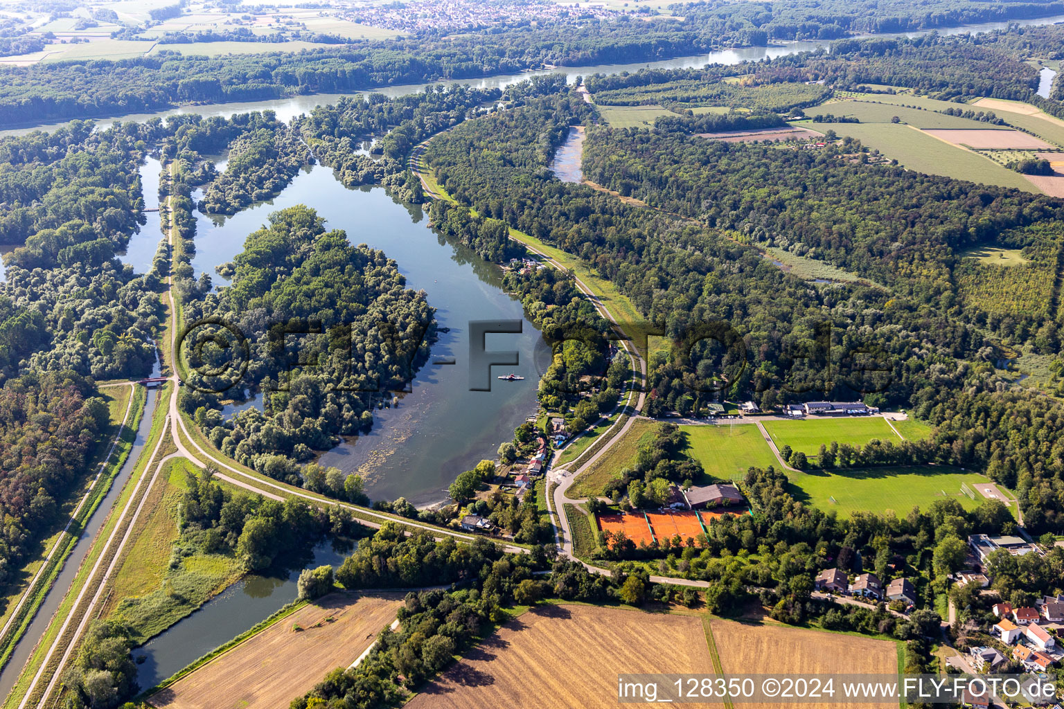 Riparian areas on the lake area of Leopoldshafen in a forest area with sport-fields in Eggenstein-Leopoldshafen in the state Baden-Wurttemberg, Germany
