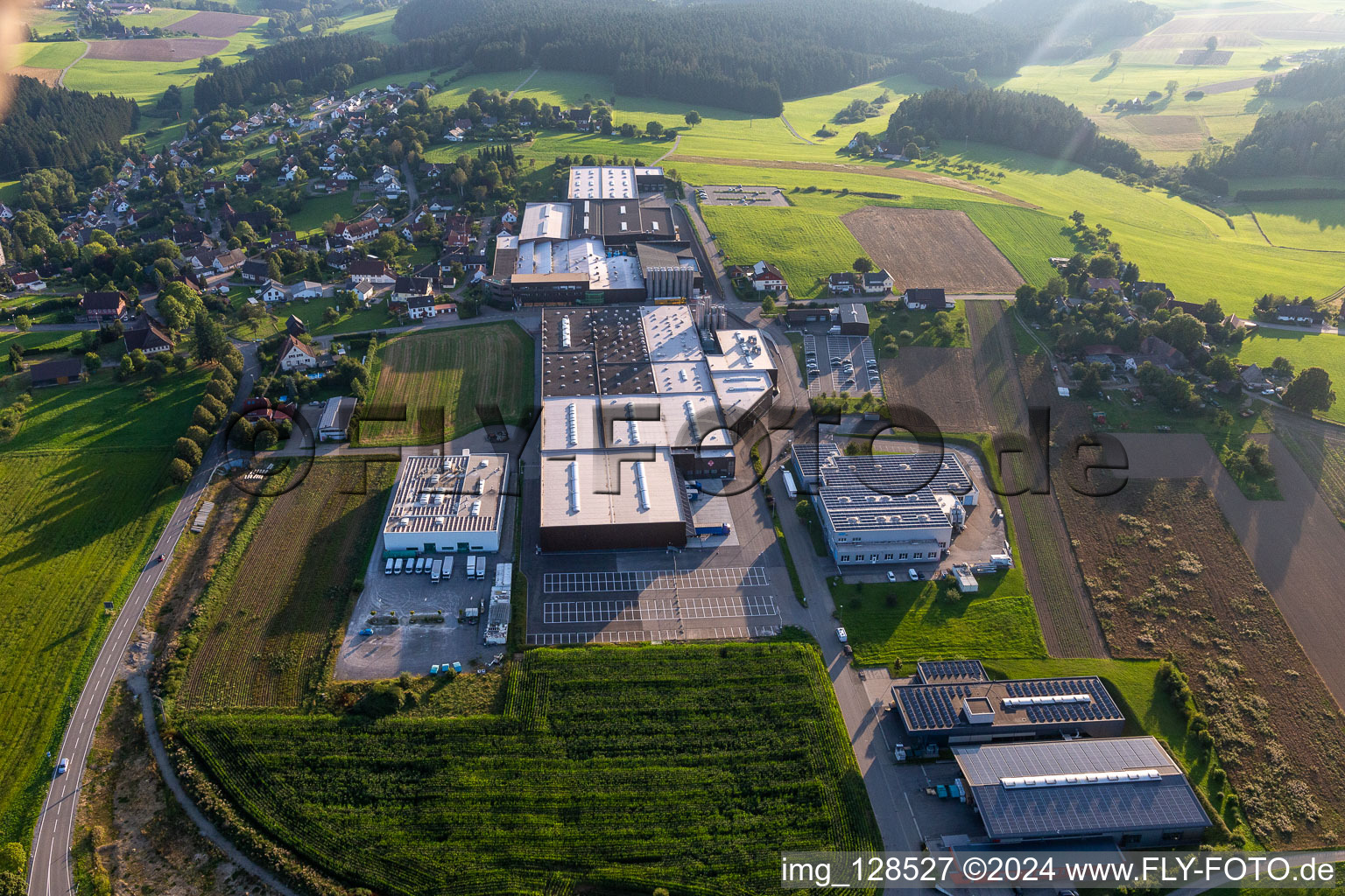 Aerial photograpy of Building and production halls on the premises of Saier Verpackungstechnik in Alpirsbach in the state Baden-Wurttemberg, Germany