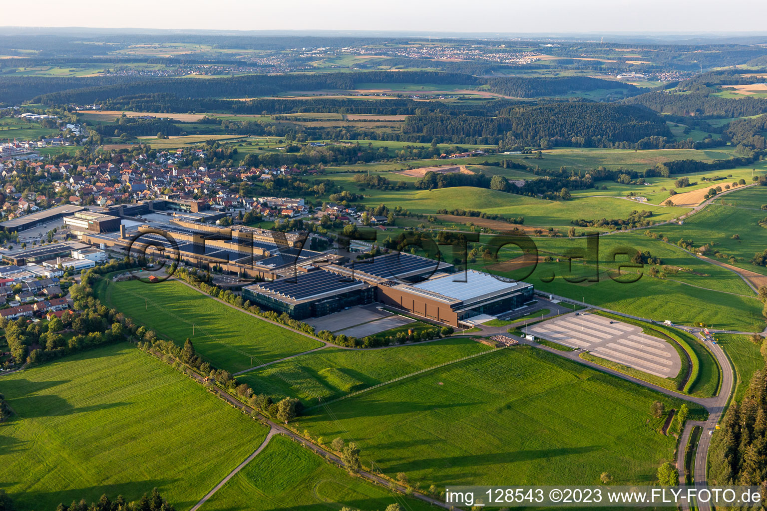 Aerial view of Building and production halls on the premises of ARBURG GmbH + Co KG in Lossburg in the state Baden-Wuerttemberg, Germany